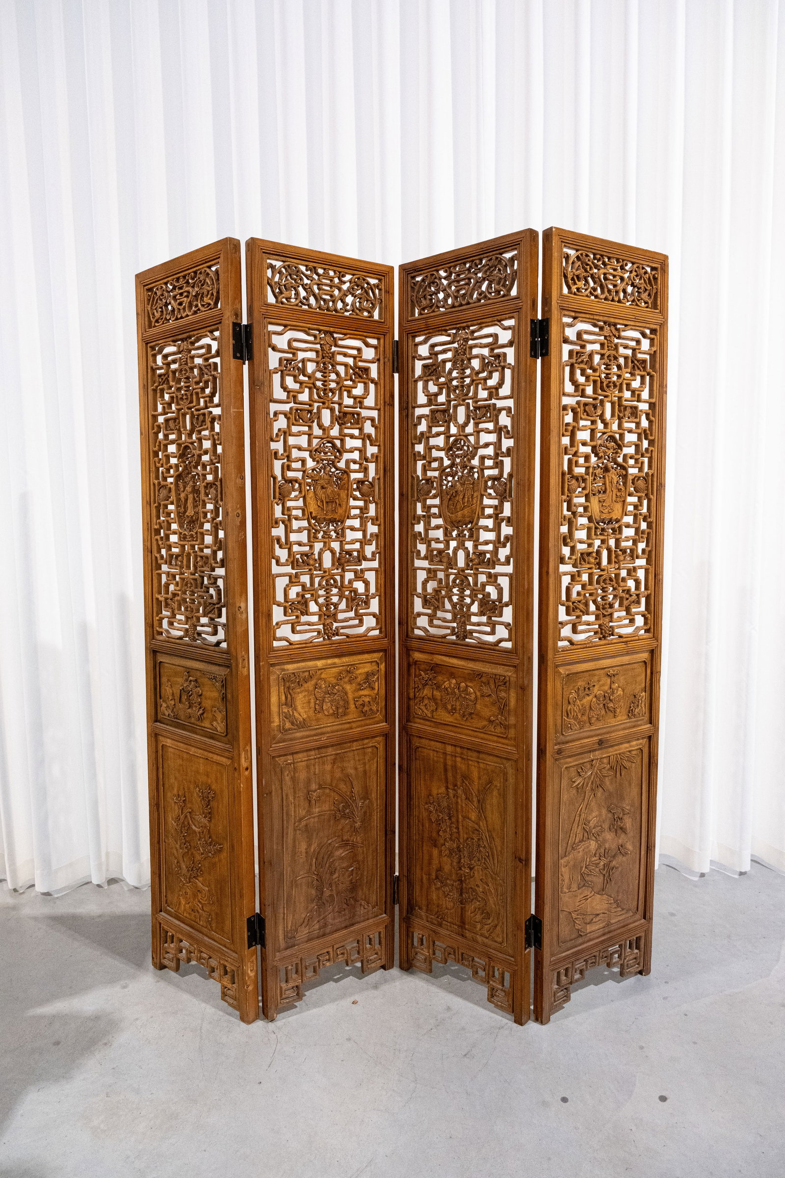 A large four-part Chinese finely carved openwork wooden room divider (1 of 10)