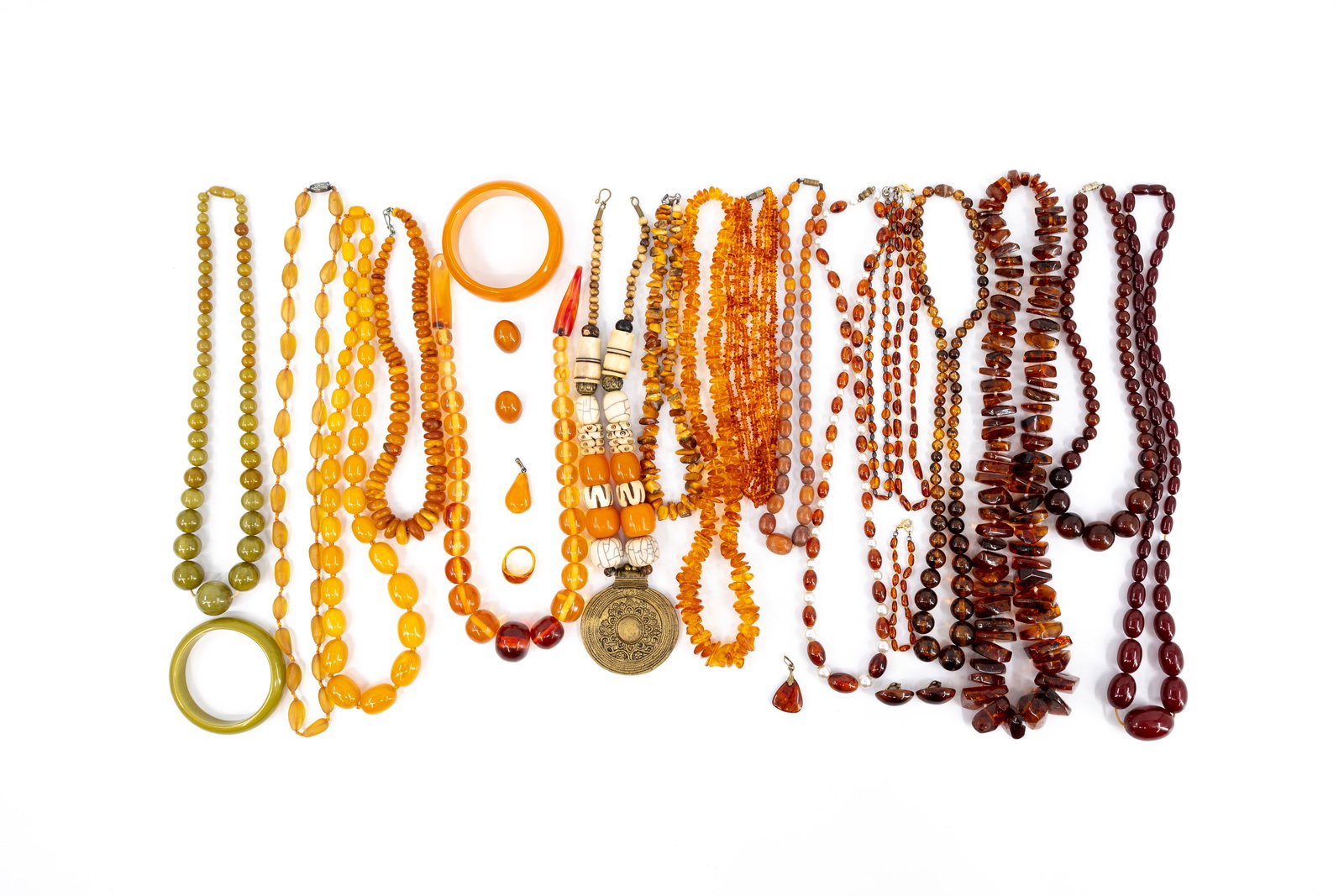 A large composed lot of 25 various necklaces and other jewelry, mostly in jade (1 of 6)