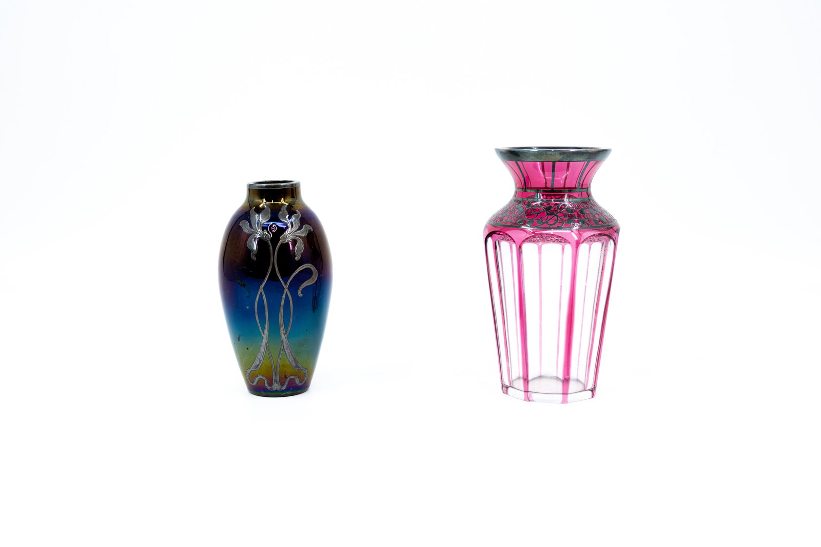 A composed lot of two art nouveau style decorated glass and cut crystal vases (1 of 9)