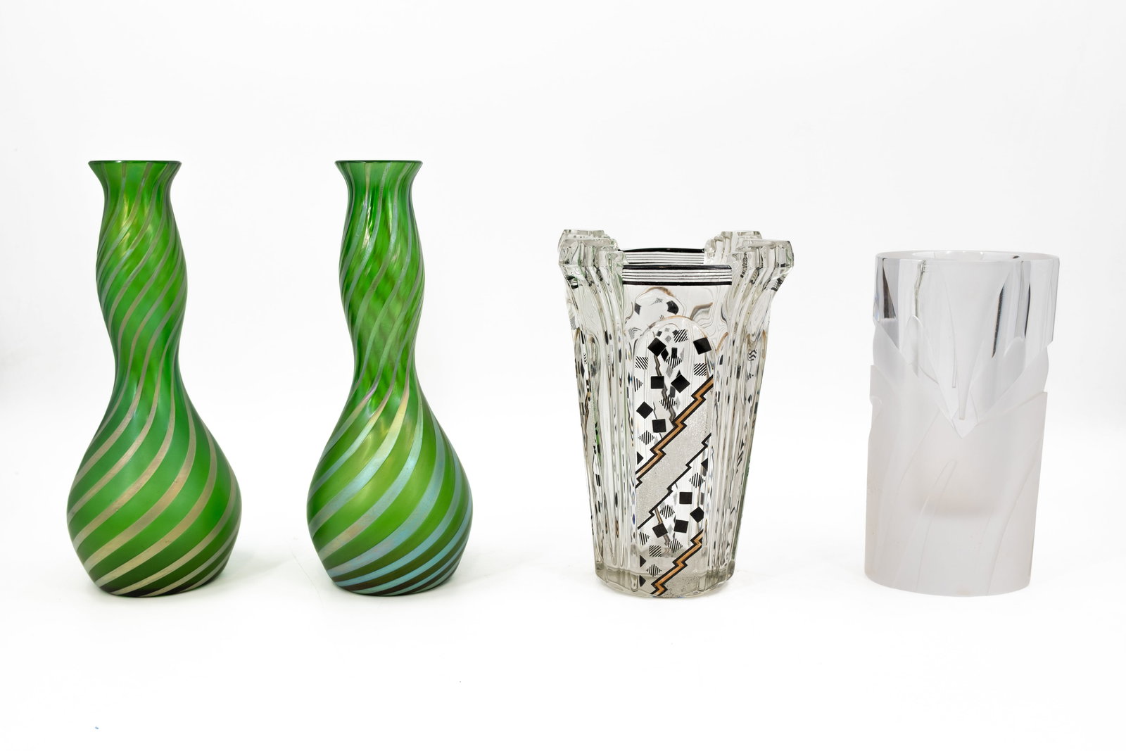 A composed lot of three variously shaped and decorated glass vases (1 of 10)