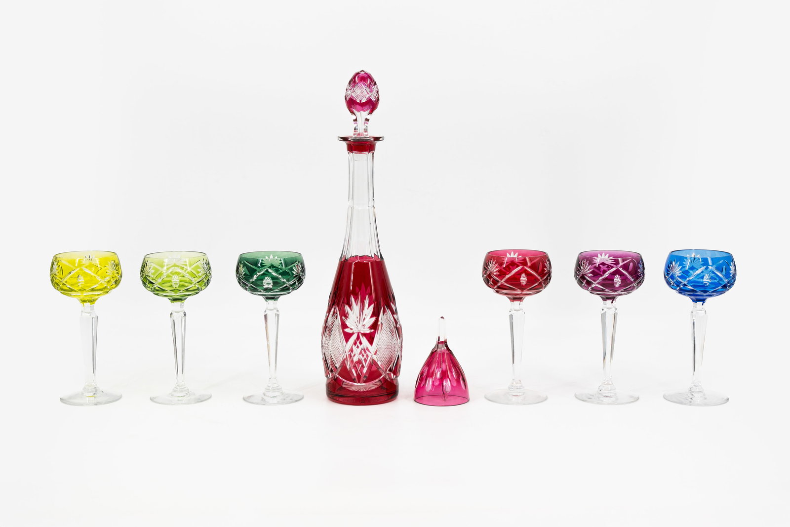 A Belgian Val Saint Lambert multi-colored cut crystal drinking set and table bell (1 of 11)