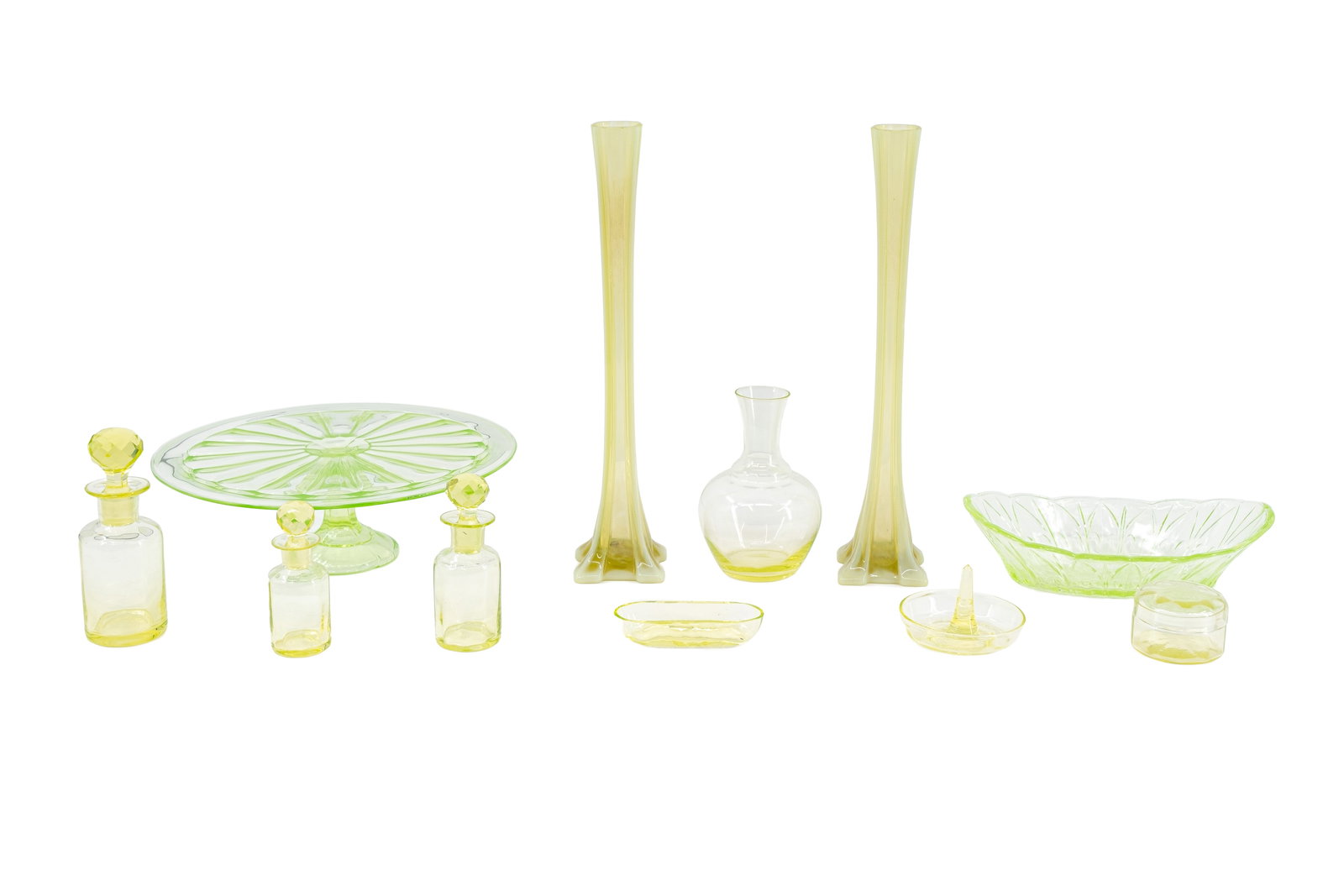 A composed lot of 11 variously shaped uranium glass objects (1 of 12)