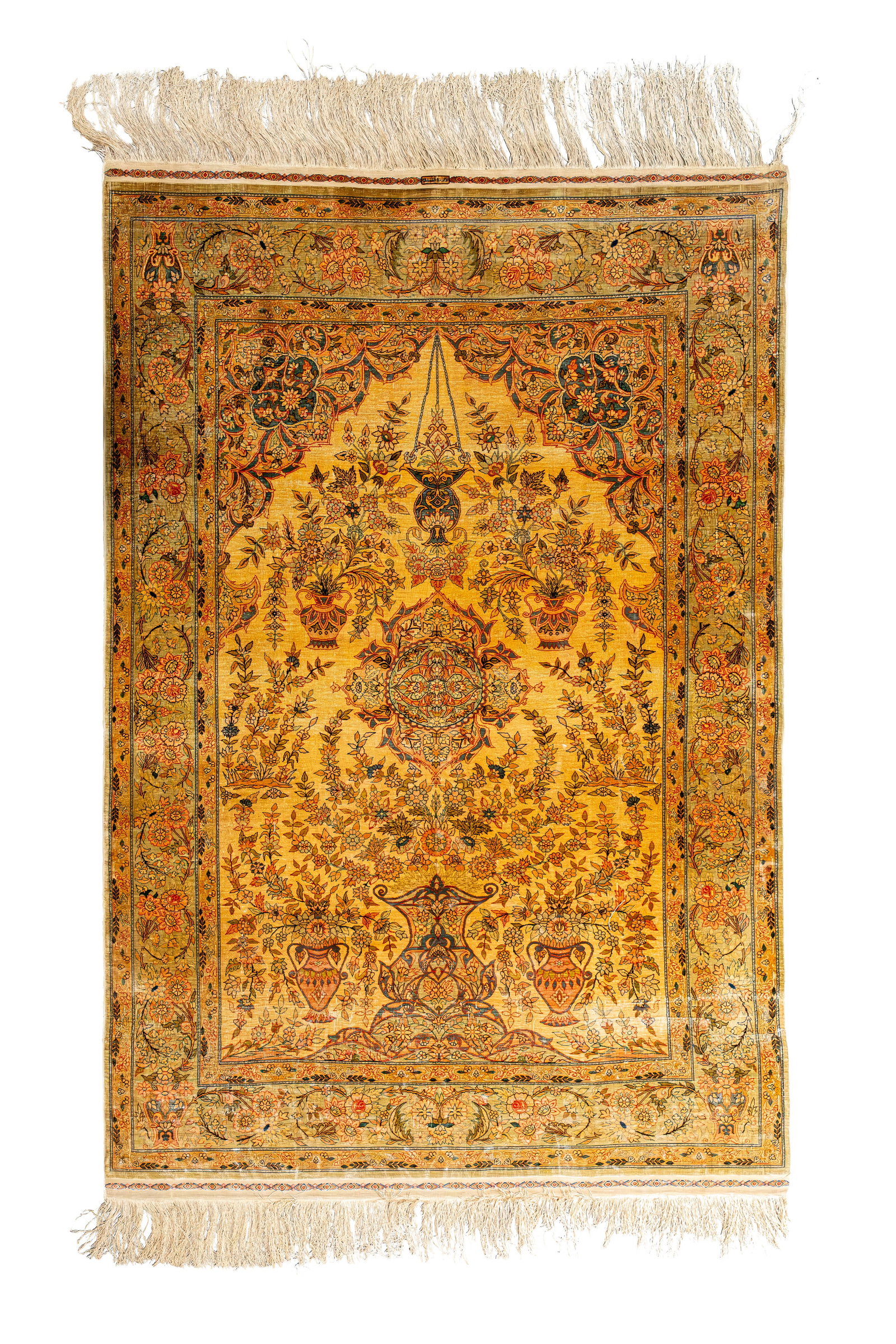 A finely hand-knotted Persian Oriental floral decorated silk carpet: A finely hand-knotted Persian Oriental floral decorated silk carpet. Marked, 20th century. L: 148 - W: 100 cm