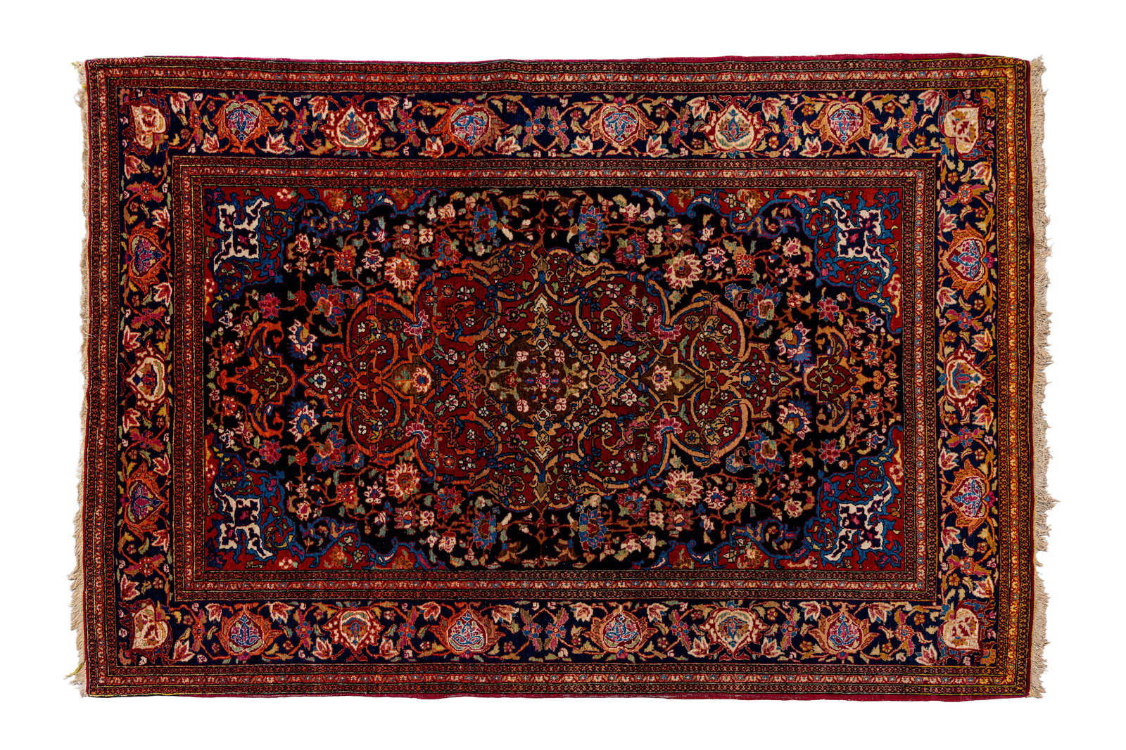 A hand-knotted Persian wool rug decorated with an elaborate central medallion (1 of 10)