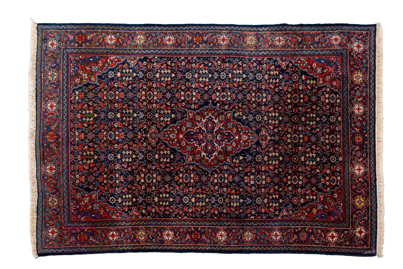 A hand-knotted Persian wool rug decorated with a central lozenge-shaped medallion (1 of 10)