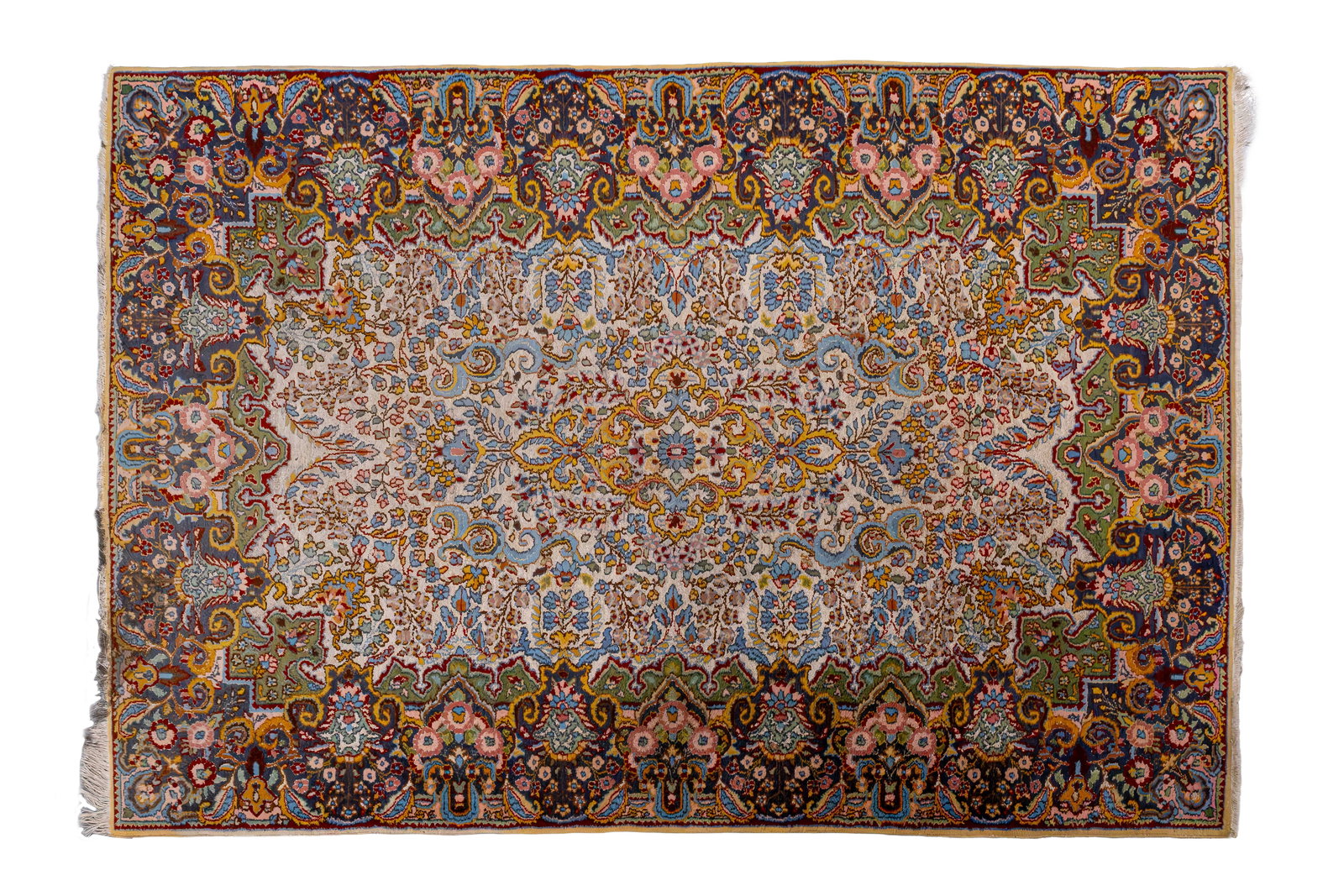 A hand-knotted Persian wool carpet, probably Kashmir, decorated with Oriental motifs (1 of 8)