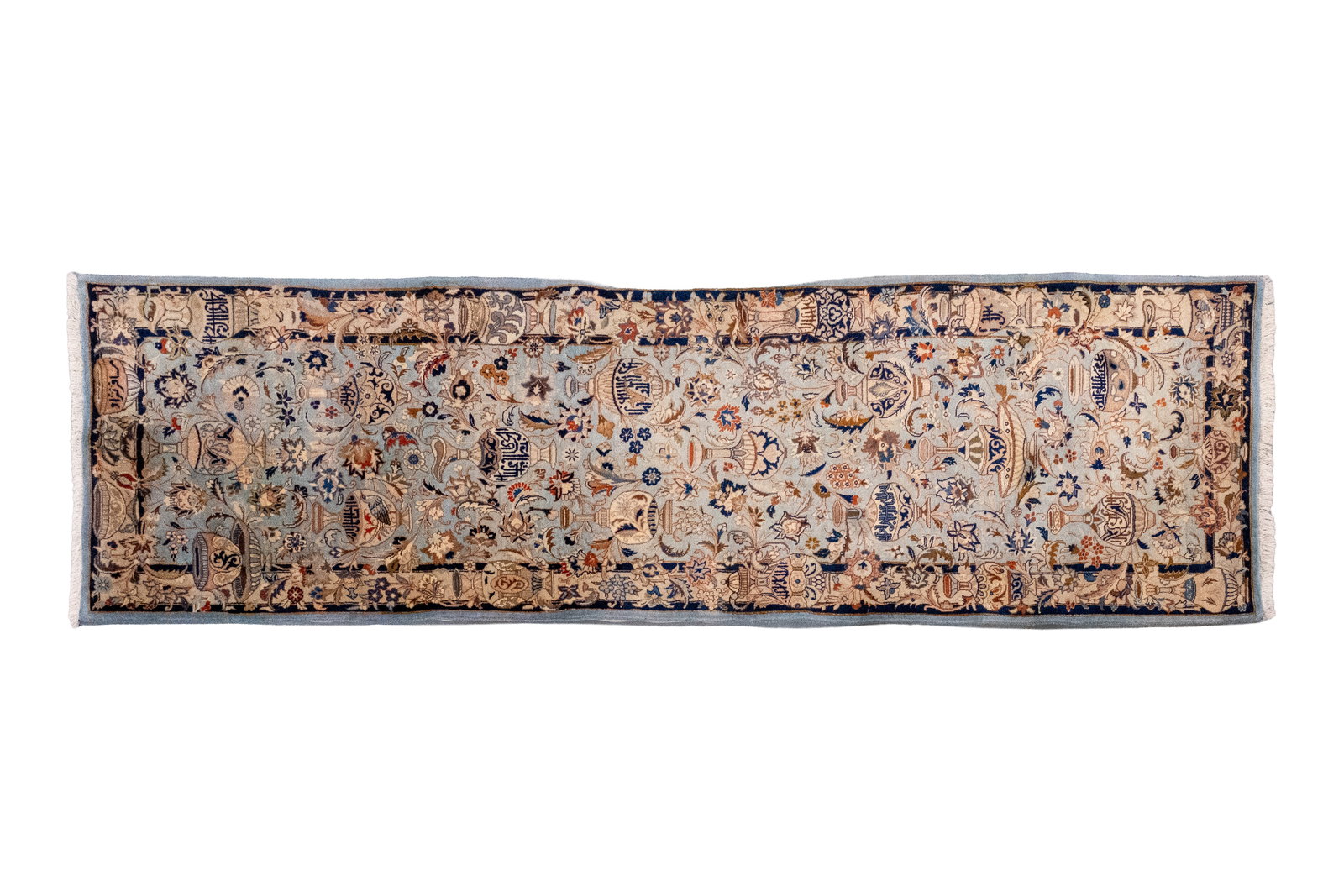 A long hand-knotted Persian wool runner with Oriental and antique-style decoration: A long hand-knotted Persian wool runner with Oriental and antique-style decoration. 20th century. L: 290 - W: 82 cm