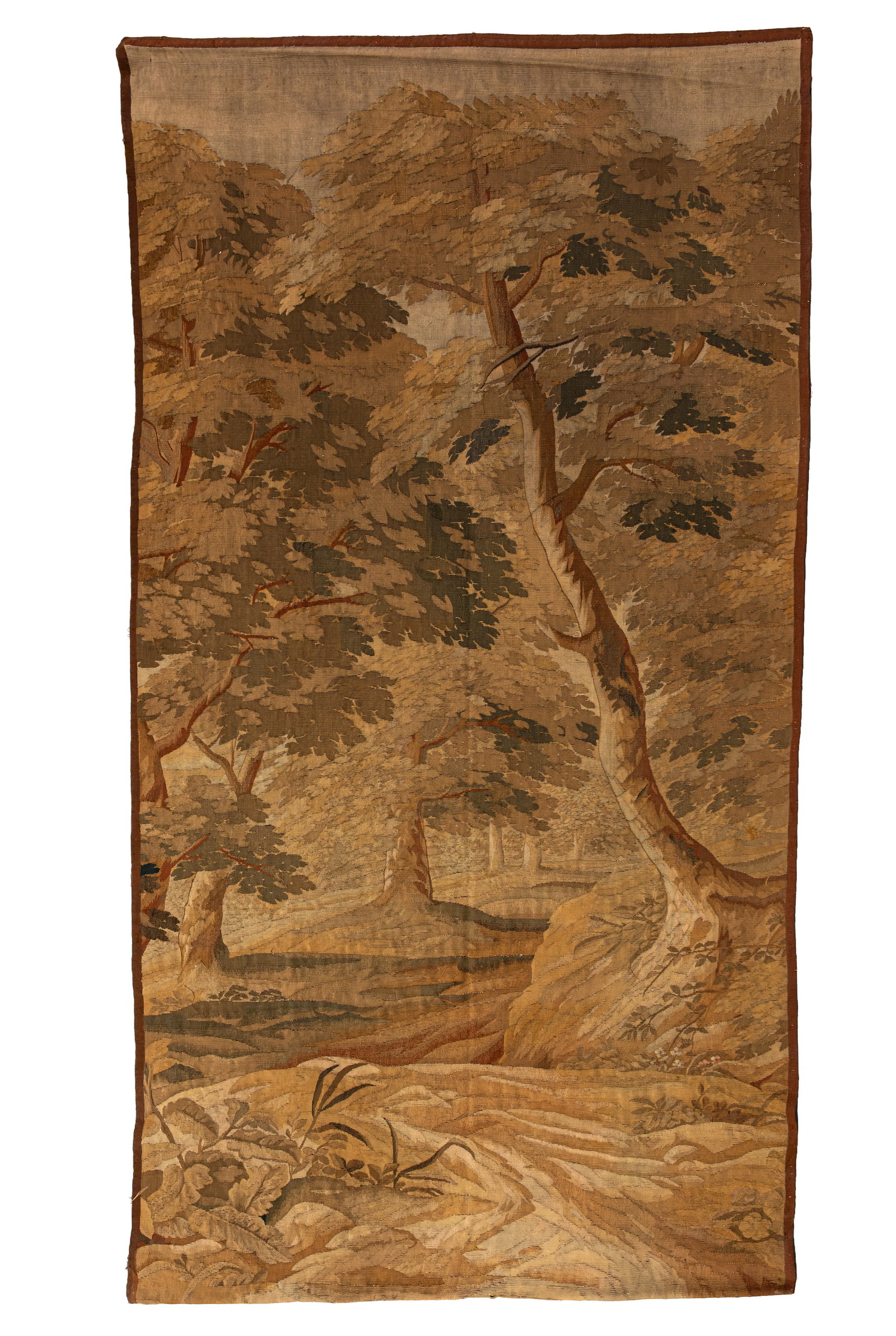 An antique hand-knotted wool wall tapestry depicting a wooded landscape: An antique hand-knotted wool wall tapestry depicting a wooded landscape. 18th century. L: 290 - W: 130cm