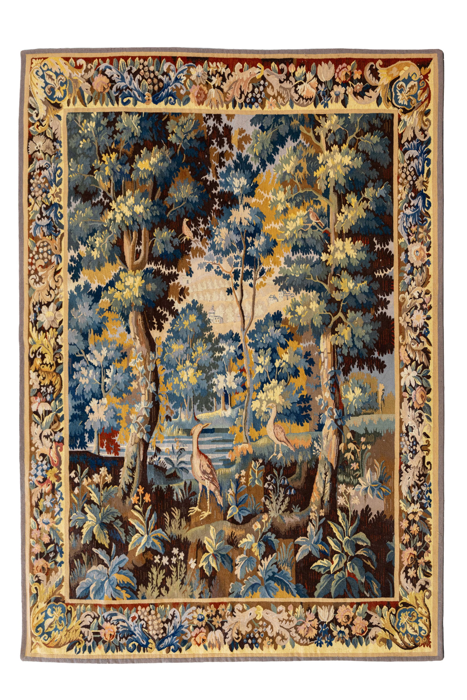 A hand-knotted European wool tapestry depicting a landscape with tall trees (1 of 8)
