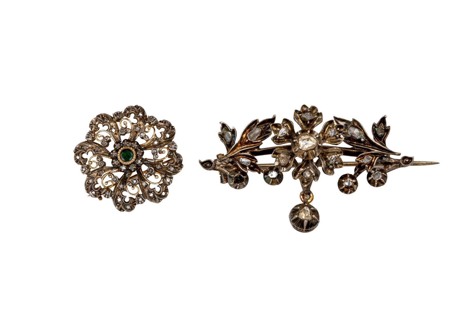 A lot of two fine gold and silver antique old cut diamond pendant-broches: A lot of two fine gold and silver antique old cut diamond pendant-broches. Circa 1900-1920s. Total weight: 24,8g