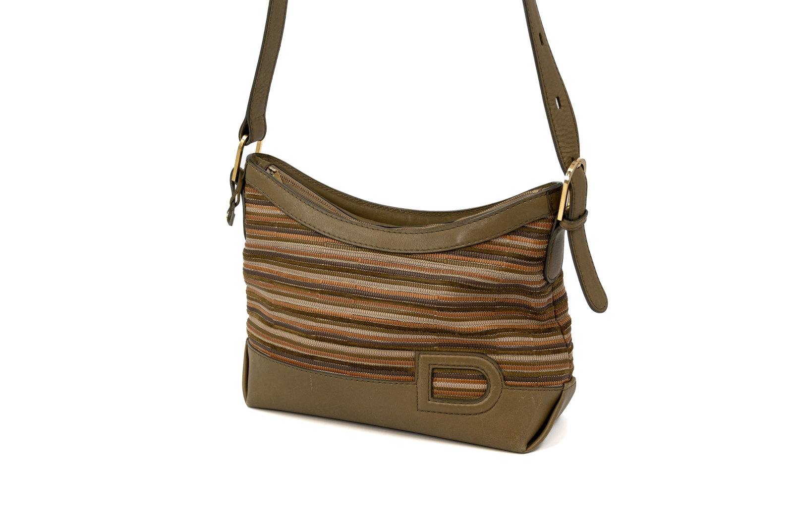 A Delvaux Shoulder Bag model Grand Place in Toile de Cuir: A Delvaux Shoulder Bag model Grand Place in green and brown Toile de Cuir. Comes with its dustbag. Condition: this bag has been used and shows some very slight wear and tear on both the outside as the
