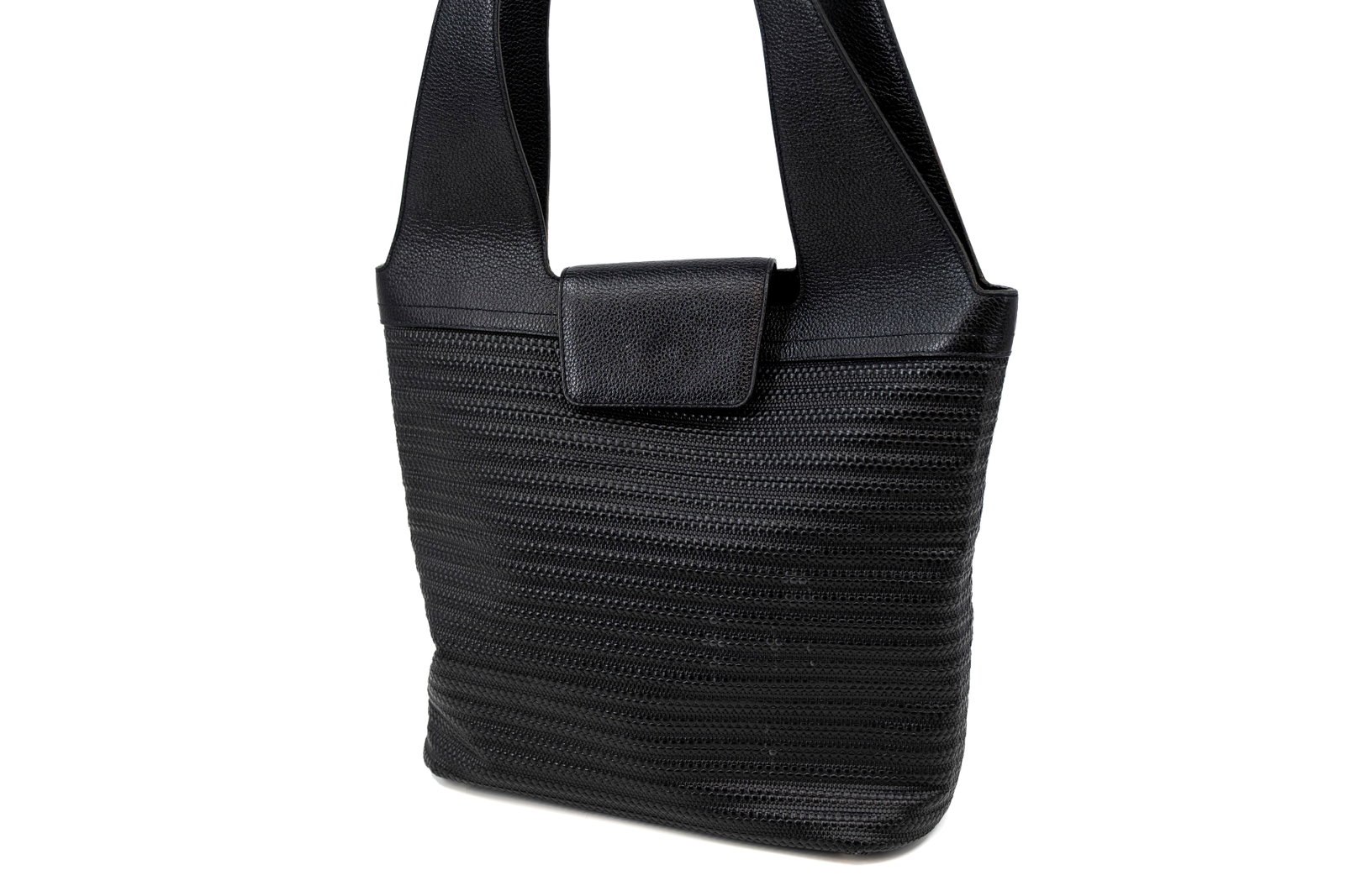 A large Delvaux shoulder bag in black toile de cuir: A large Delvaux shoulder bag in black toile de cuir. Comes with its vanity mirror. Condition: this bag is in used but well-maintained condition, no major flaws except for some staining on the interior