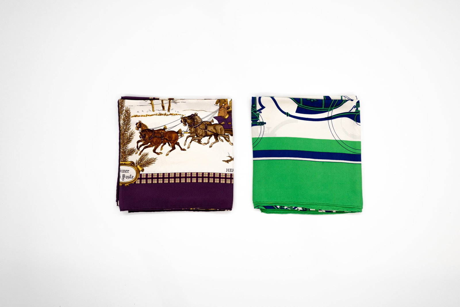 A composed lot of two Classic Carré Hermes scarves with carriages designs: Lot 249. A composed lot of two Classic Carré Hermes scarves. Design "L'Hiver en Poste" designed by Henri De Linares and "Ex Libris" designed by Hugo Grygkar. Condition: "L'Hiver en Poste" comes in it