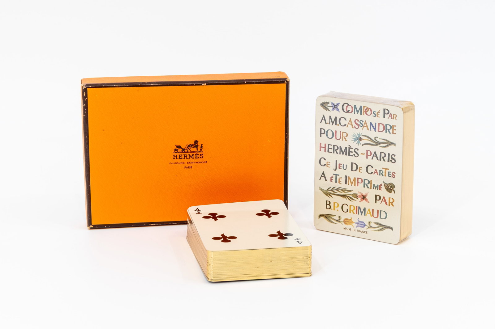 A vintage set of Hermès playing cards designed by Cassandre: A vintage set of Hermès playing cards designed by Cassandre for Hermès-Paris and made by Draeger Frères. One deck is still in its original packaging.