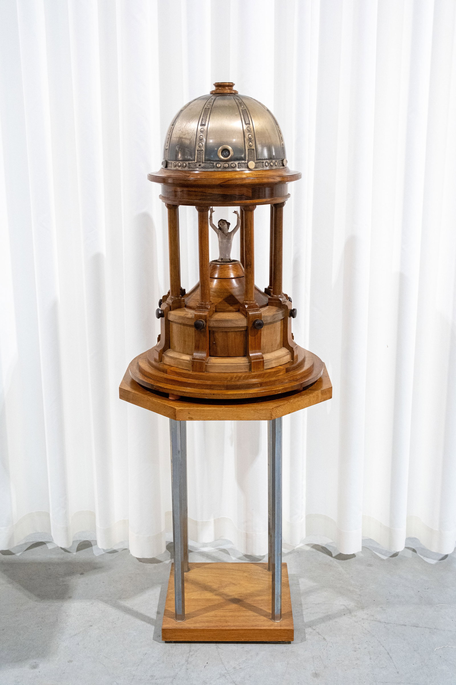 A rare art deco chapel-shaped wooden decorated radio: A rare art deco chapel-shaped wooden decorated radio. Standing on a chrome and wooden base. In the middle with half nude lady porcelain figurine. Circa 1900-1920s. H: 151 cm, total H: 77 cm, without b