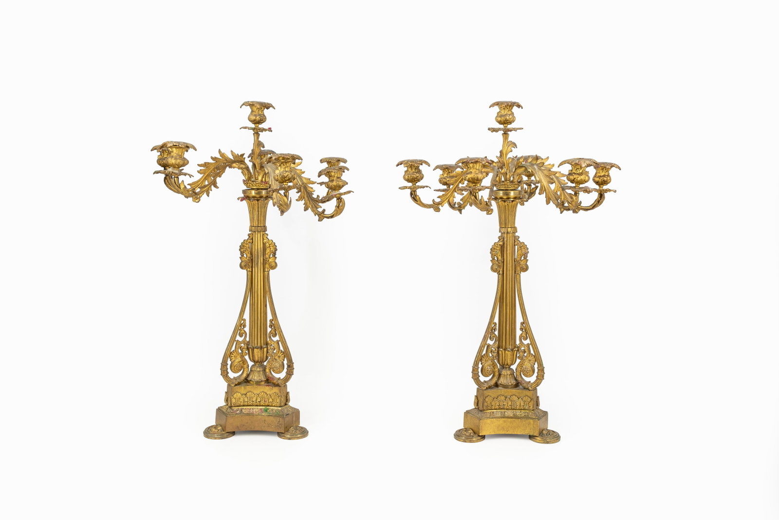 An antique and large pair of Louis XV style gilt brass candelabras: An antique and large pair of Louis XV style gilt brass candelabras. Late 19th century. H: 79 - W: 53 cm