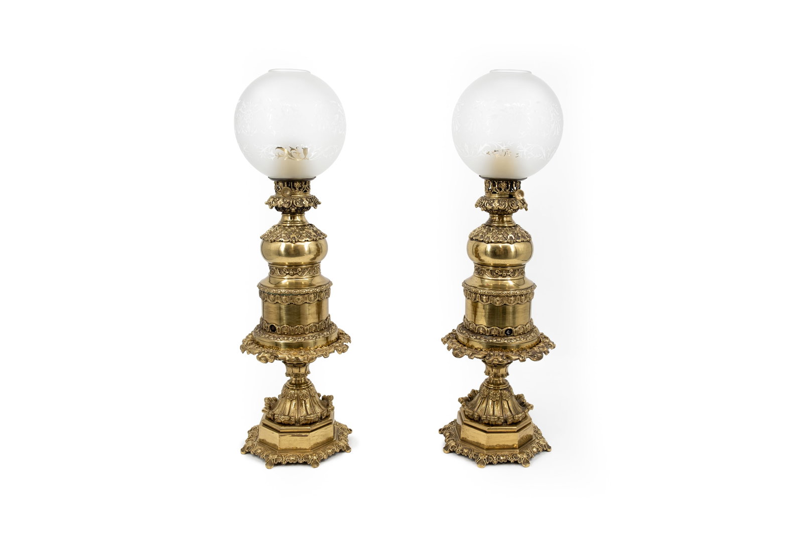 An antique pair of brass decorated oil lamps with built-in automaton system (1 of 15)