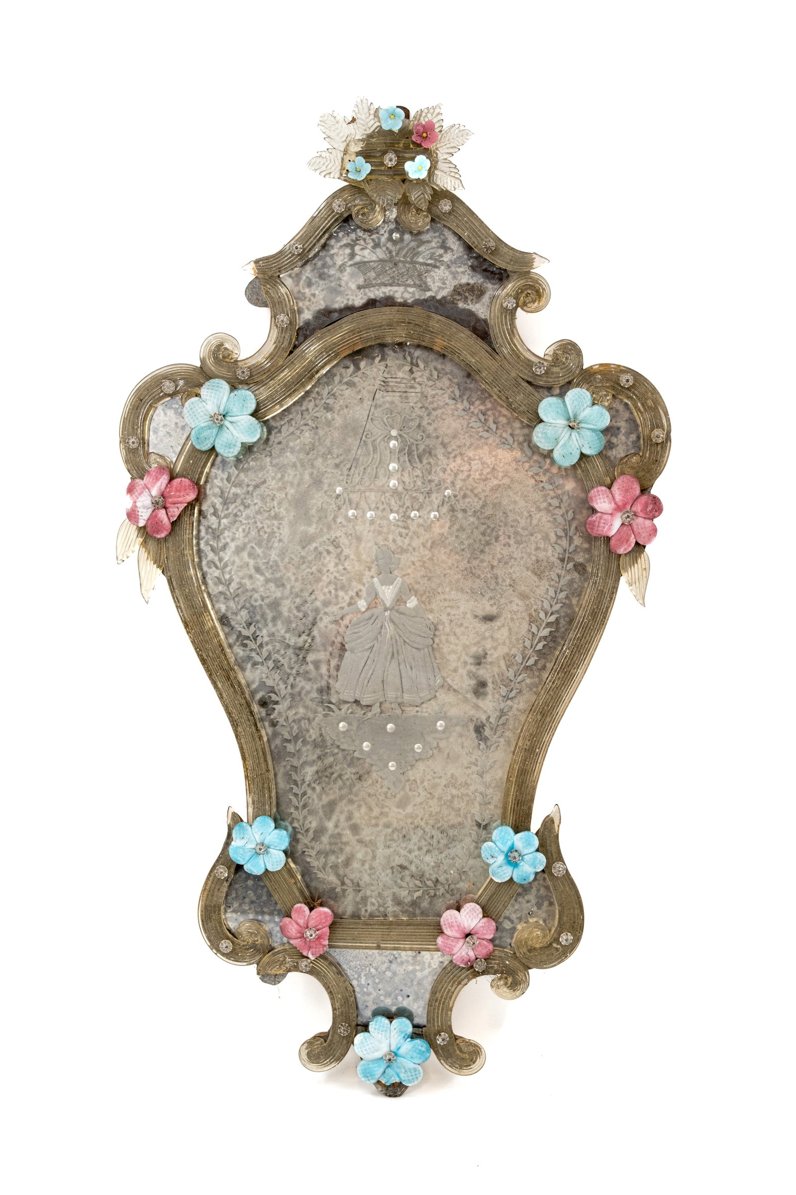 A vintage Venitian Murano glass mounted mirror with finely chiseled decoration: A vintage Venitian Murano glass mounted mirror with finely chiseled decoration. Italy, circa 1950-1960s. Small damages, report available on request. H: 70 - W: 38 cm