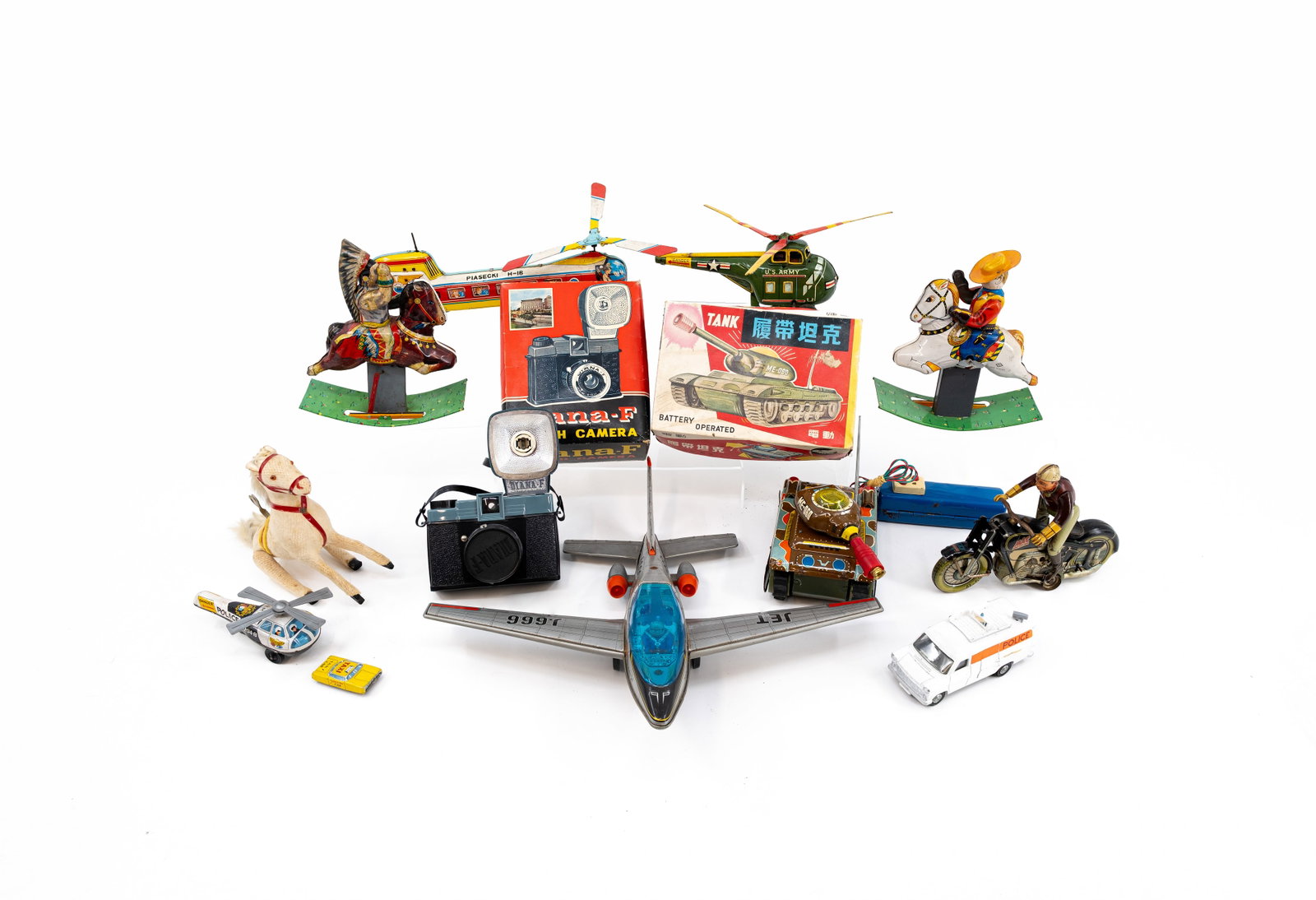 A large composed lot of 12 various vintage collector toys: A large composed lot of 12 various vintage collector toys. Consisting of: - one fighter jet - three helicopters - one tank - three horses - one motor rider - two cars - one toy camera
