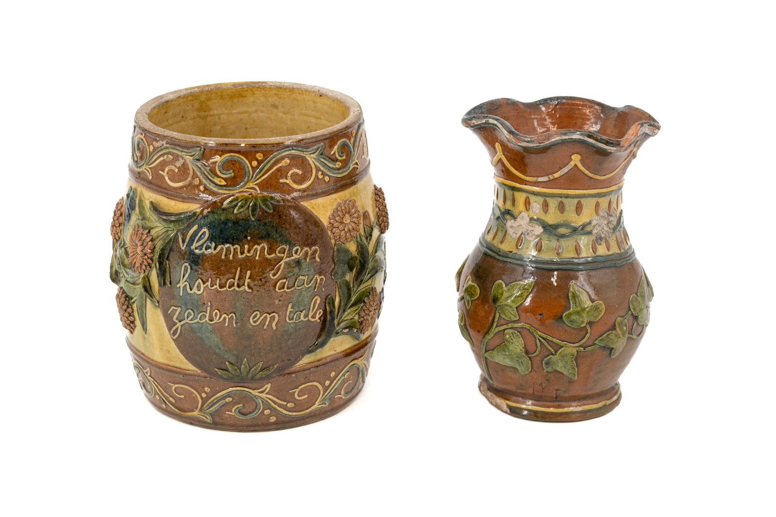 A composed lot of a Flemish Torhout decorated earthenware tabacco jar and vase (1 of 14)