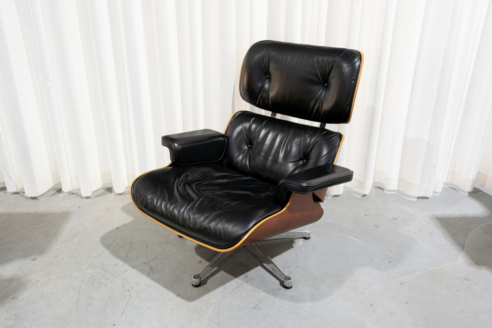 A design leather & Ottoman lounge chair designed by Charles & Ray Eames for Vitra (1 of 6)