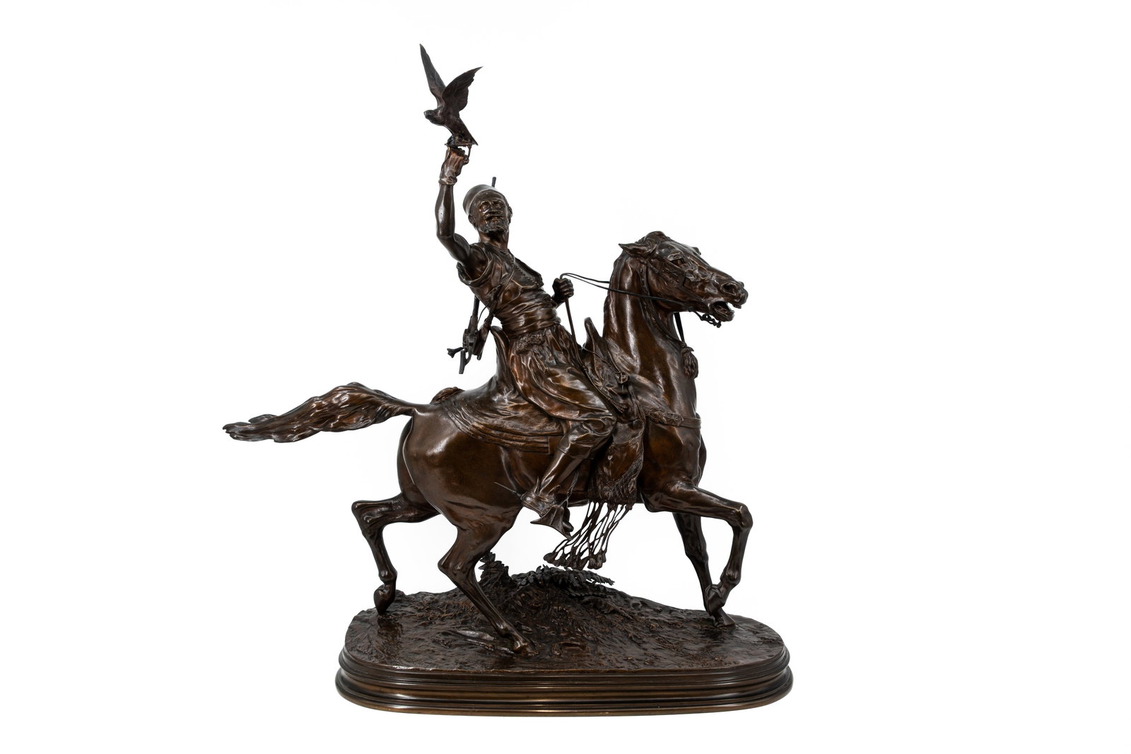 Pierre Jules MÈNE (1810-1879) "Le Fauconnier Arabe à Cheval", a large antique patinated bronze: Pierre Jules MÈNE (1810-1879) "Le Fauconnier Arabe à Cheval". A large antique and French patinated bronze sculpture of an Arab falconer on horseback. Very finely cast. Signed, 19th century. The falc