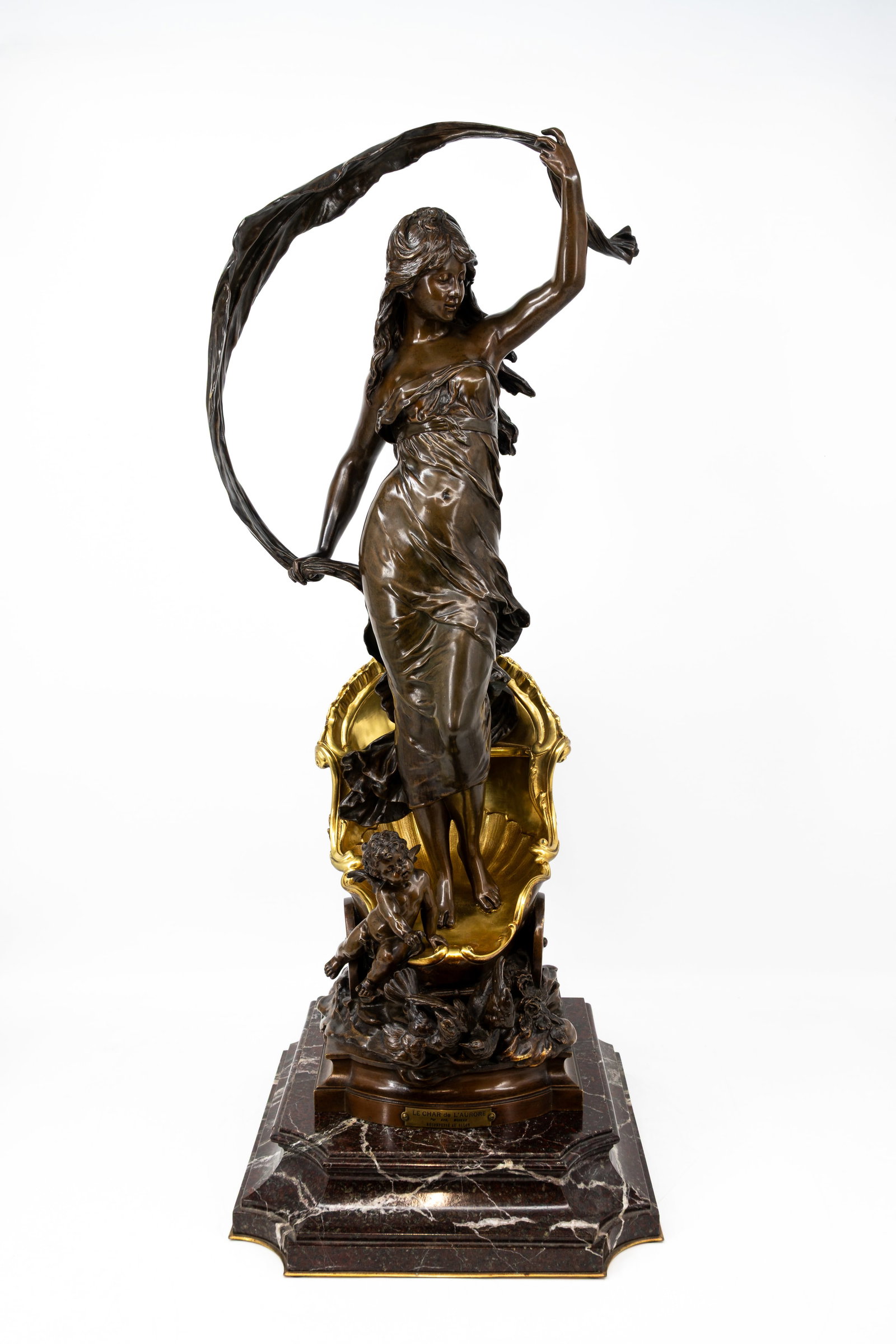 Auguste MOREAU (1834-1917) "Le Char de L'Aurore" A large antique French bronze sculpture: Auguste MOREAU (1834-1917) "Le Char de L'Aurore". A large antique French patinated gilt bronze sculpture representing Aurora, the goddess of dawn. Very finely cast and footed on a dark red marble base