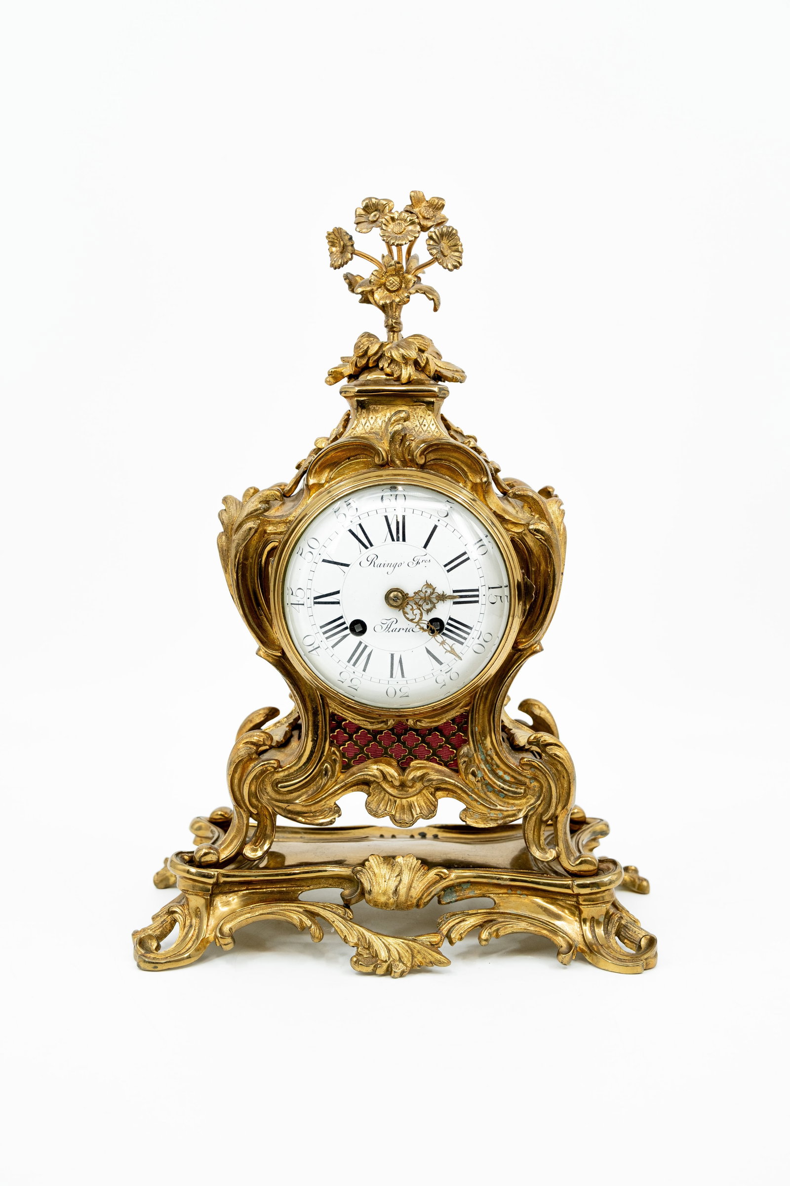 RAINGO Frères (Paris, 1823) A French Louis XV-style gilt bronze table clock (1 of 10)