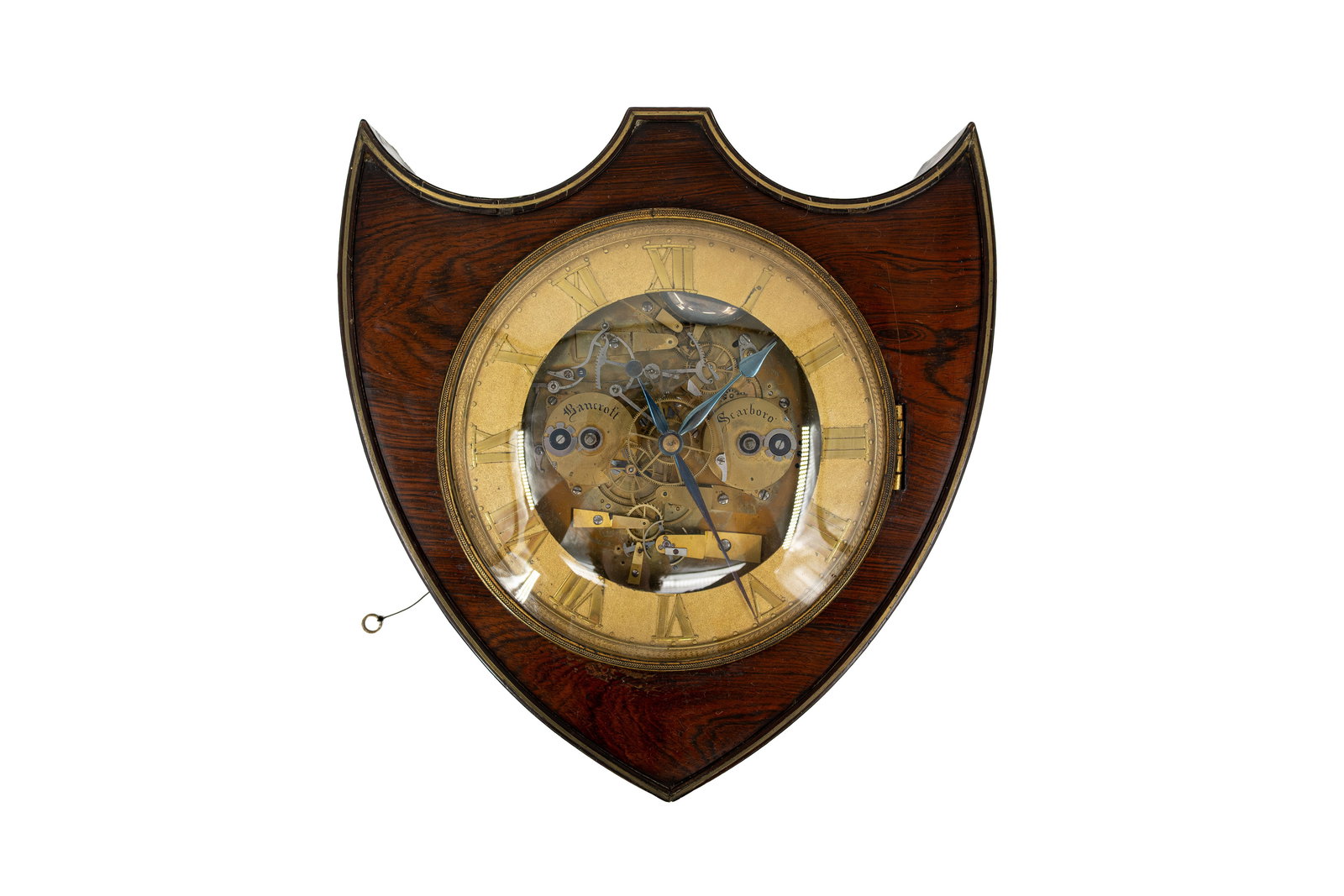 An antique English skeleton wall clock marked by Bancroft - Scarborough: An antique English skeleton brass mounted wooden wall clock marked by Bancroft - Scarborough. England, 19th century. H: 34 - W: 32 cm