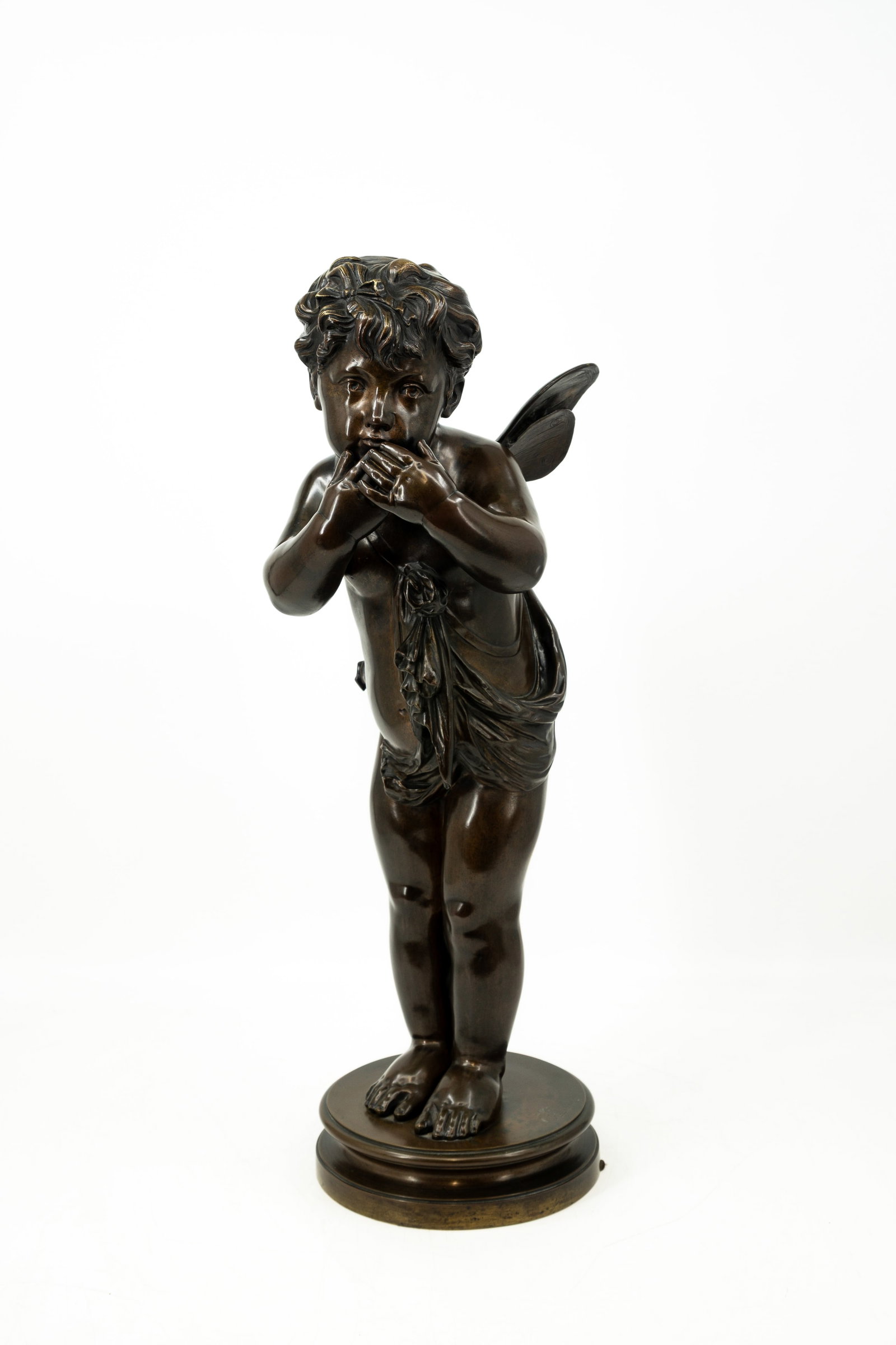Victor Léopold ROUSSEAU (1865-1954) An antique Belgian patinated bronze sculpture: Victor Léopold ROUSSEAU (1865-1954) An antique Belgian patinated bronze sculpture of a standing putto. Signed, late 19th century. H: 65 cm