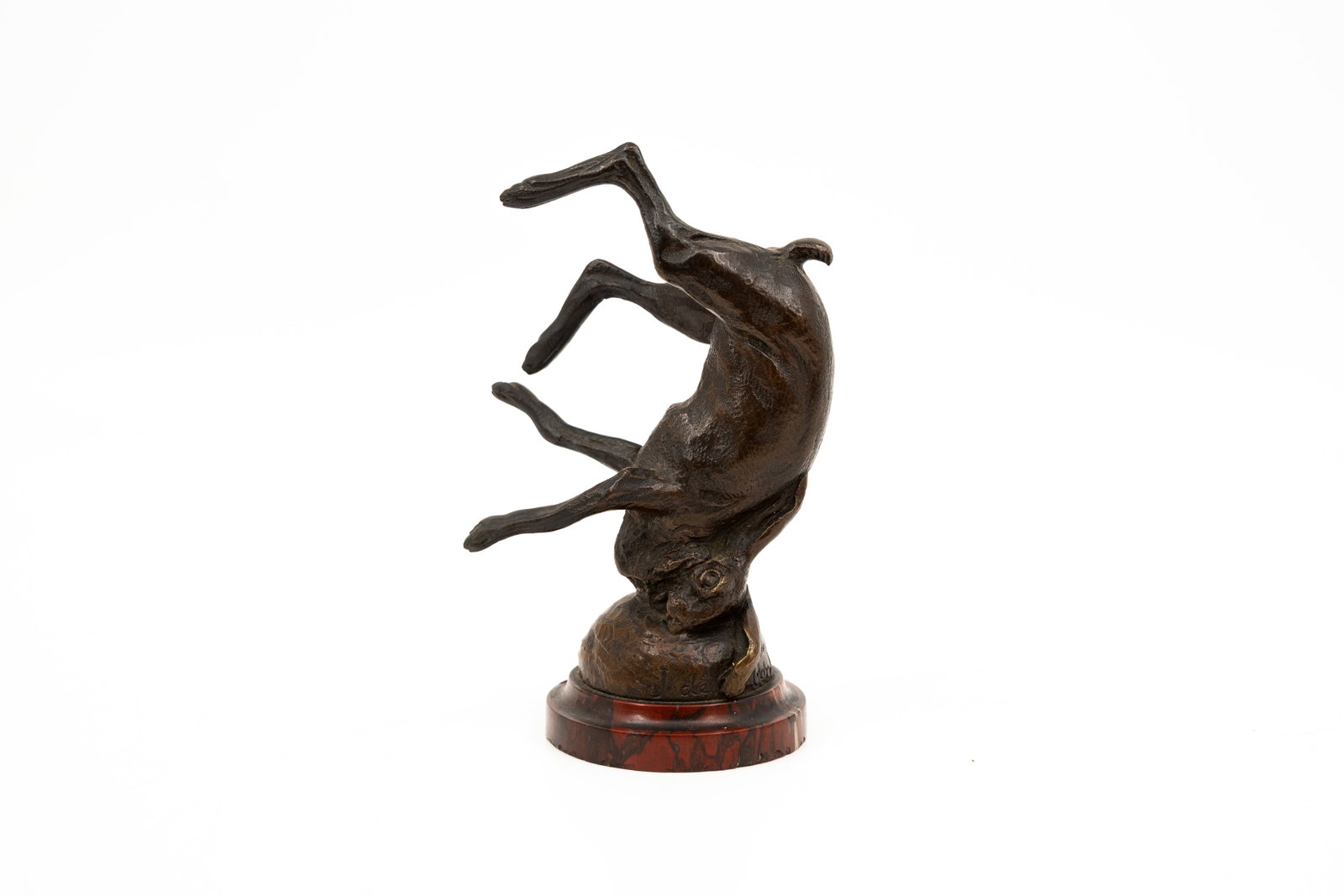 Joseph DE MONTBEL (1861-1938) An antique French patinated bronze animalier sculpture: Joseph DE MONTBEL (1861-1938) An antique French patinated bronze animalier sculpture representing of hunting trophy. Mounted on a round red marble base. Signed, late 19th century. Old damage on the ma