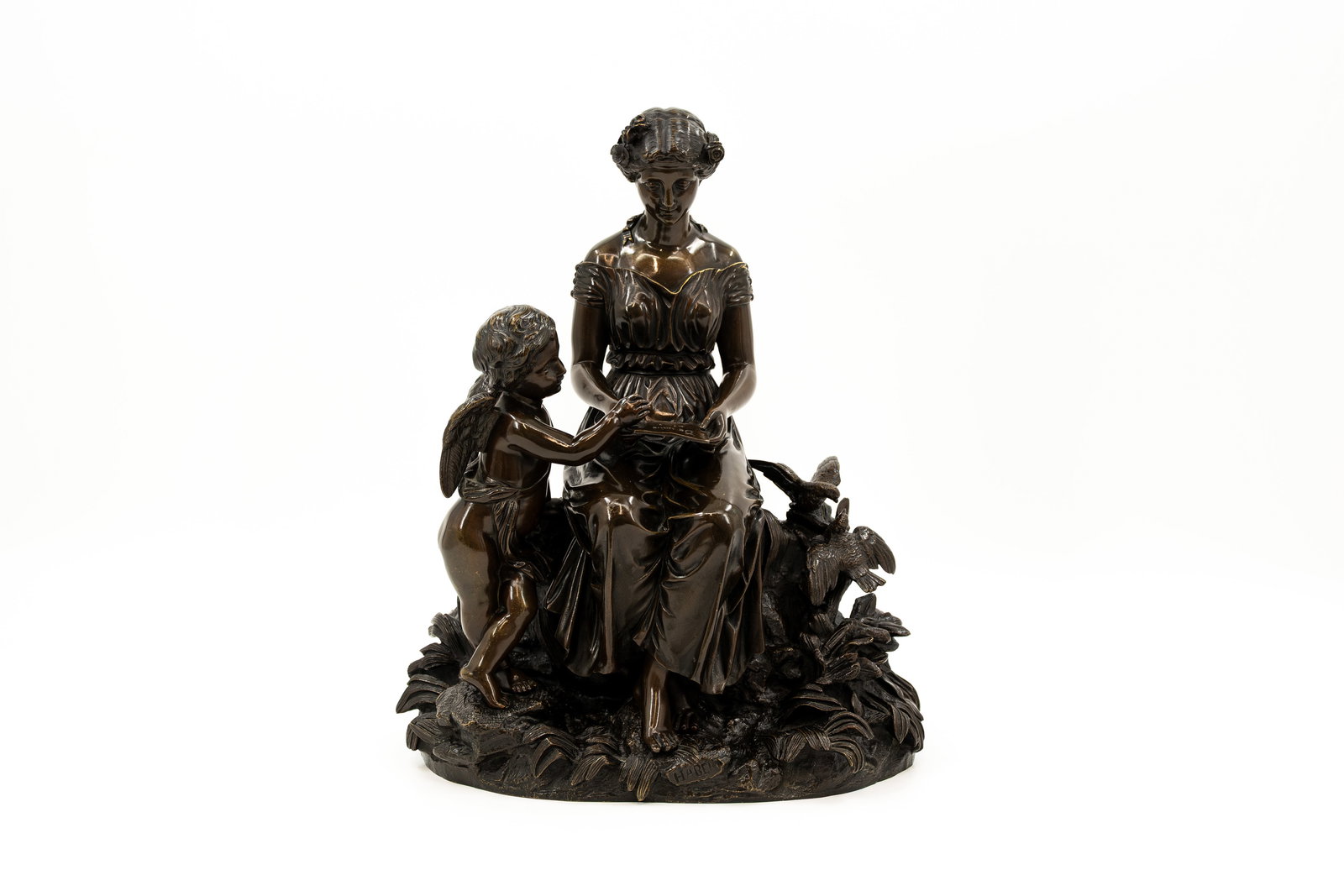 Alfred Louis HABERT (1824-1893) A French bronze figural group sculpture: Alfred Louis HABERT (1824-1893) A French bronze figural group sculpture representing a lady and cupid writing a love letter. Late 19th century. H: 36 - W: 28 cm