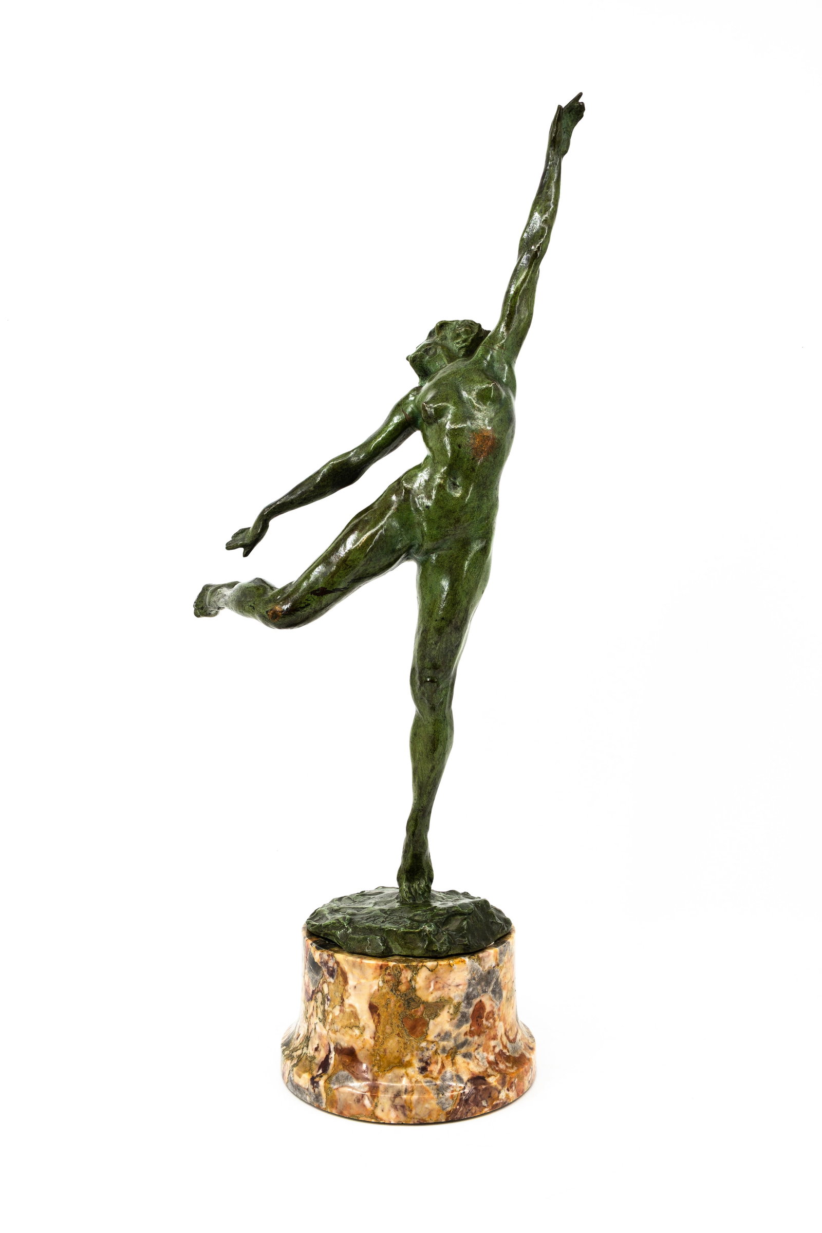 Arthur Pierre (1866-1938) A large antique green-patinated bronze sculpture: Arthur Pierre (1866-1938) A large antique green-patinated bronze sculpture depicting a female dancer. Footed on a round marble base. Signed, circa 1900-1920s.