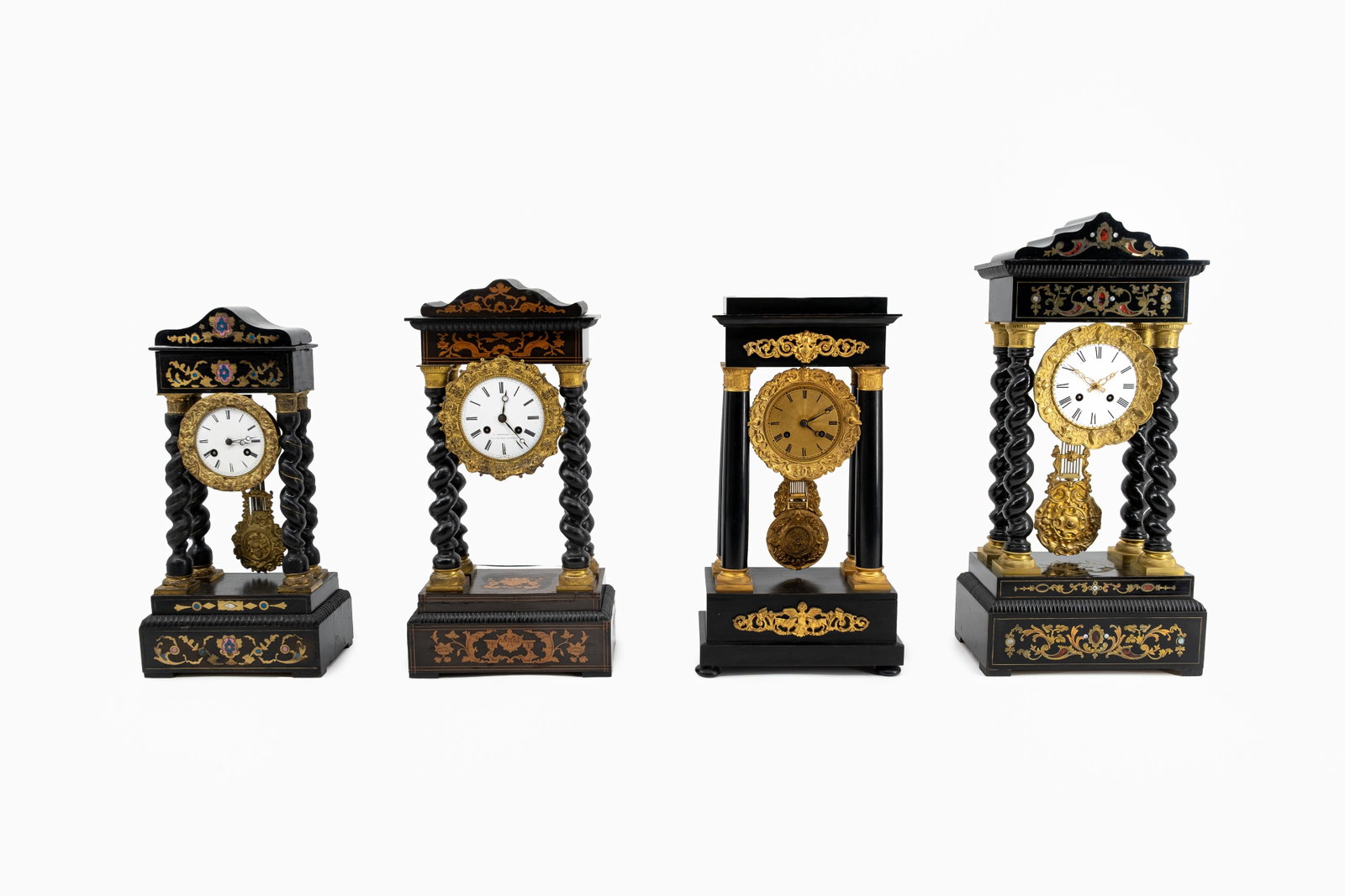 A composed lot of four similar Napoleon III wooden cartel clocks (1 of 20)