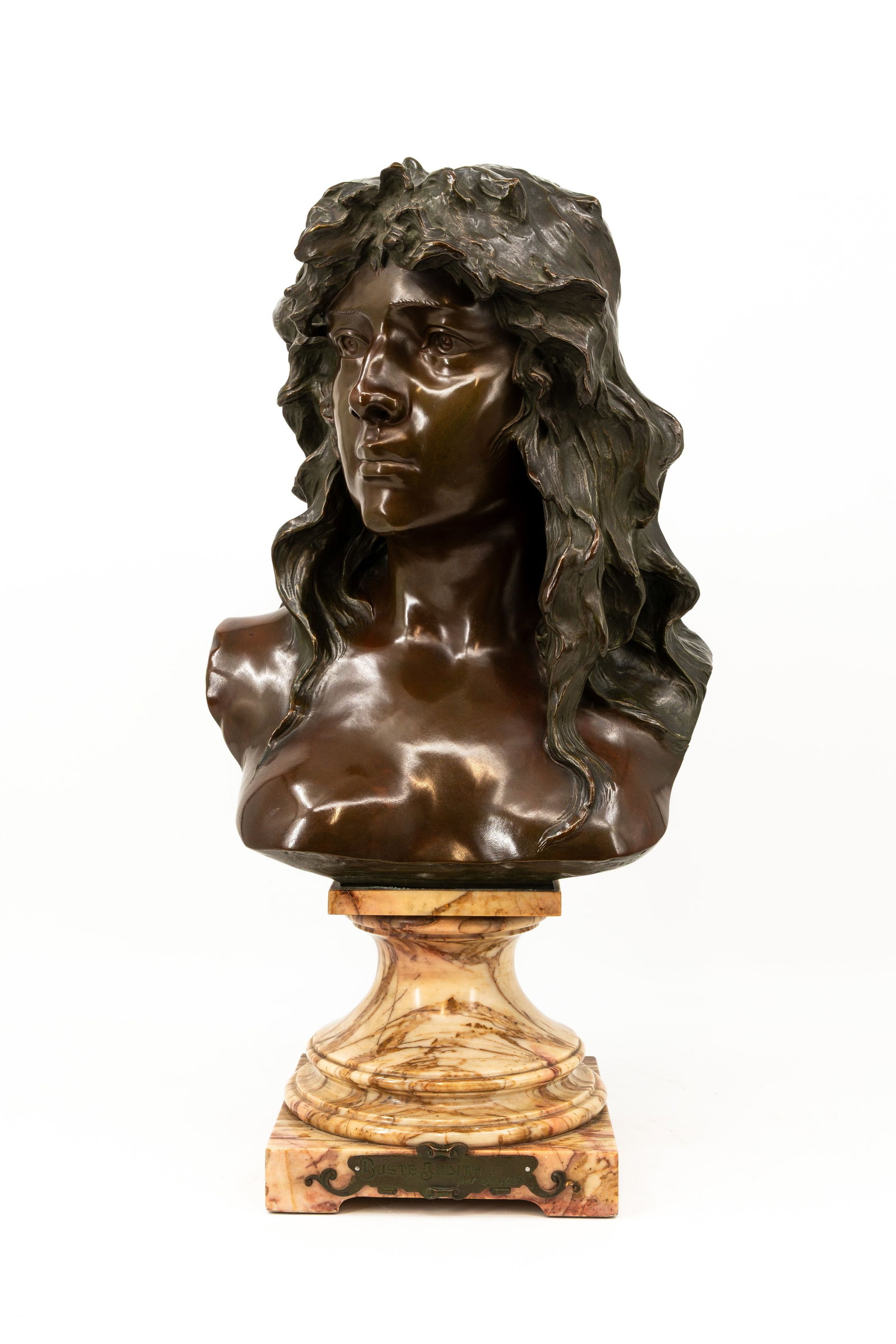 Henri JACOBS (1864-1935) "Buste de Judith" A patinated bronze bust sculpture: Henri JACOBS (1864-1935) "Buste de Judith" A patinated bronze bust sculpture of Judith. Mounted on a marble base. Signed, circa 1900. H: 62 cm, total