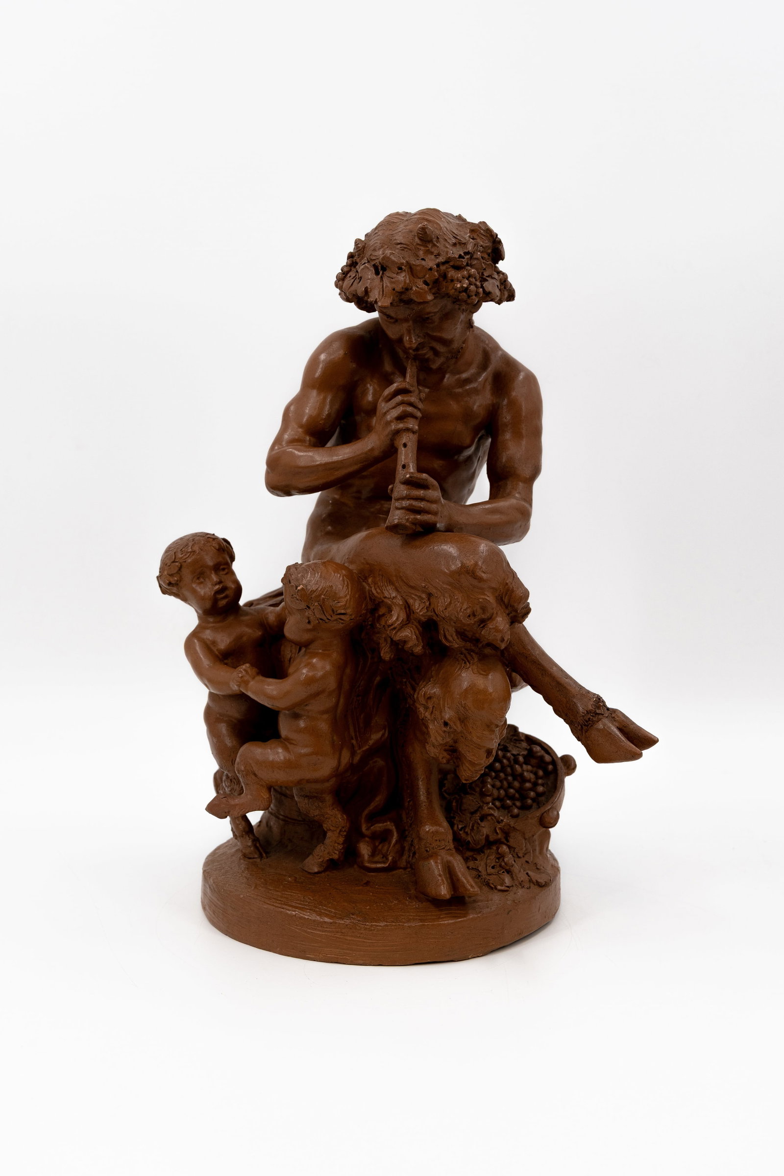 Claude Michel CLODION (1738-1814) After. "Faun with Flute" A patinated terracotta sculpture: Claude Michel CLODION (1738-1814) After. "Faun with Flute" A patinated terracotta sculpture. Signed "Clodion". H: 41,5 cm