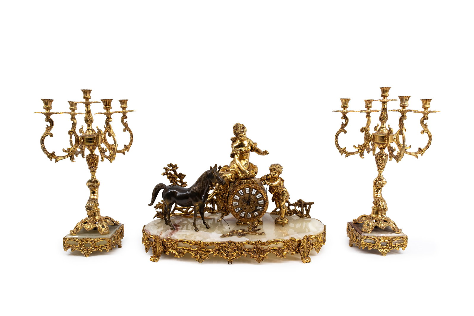 A large matching 20th-century Louis XV-style onyx marble and gilt brass figural mantel clock set: A large matching 20th-century Louis XV-style onyx marble and gilt brass figural mantel clock set. Circa 1970s. H: 43 - W: 63 cm, clock