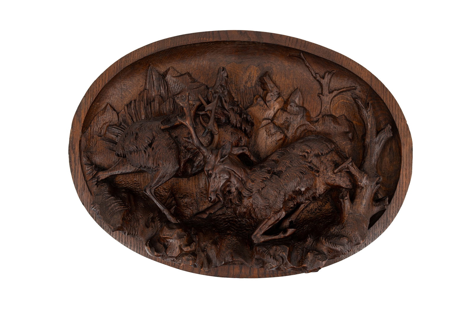 An antique carved wooden Black Forest oval shaped wall bas-relief sculpture (1 of 3)