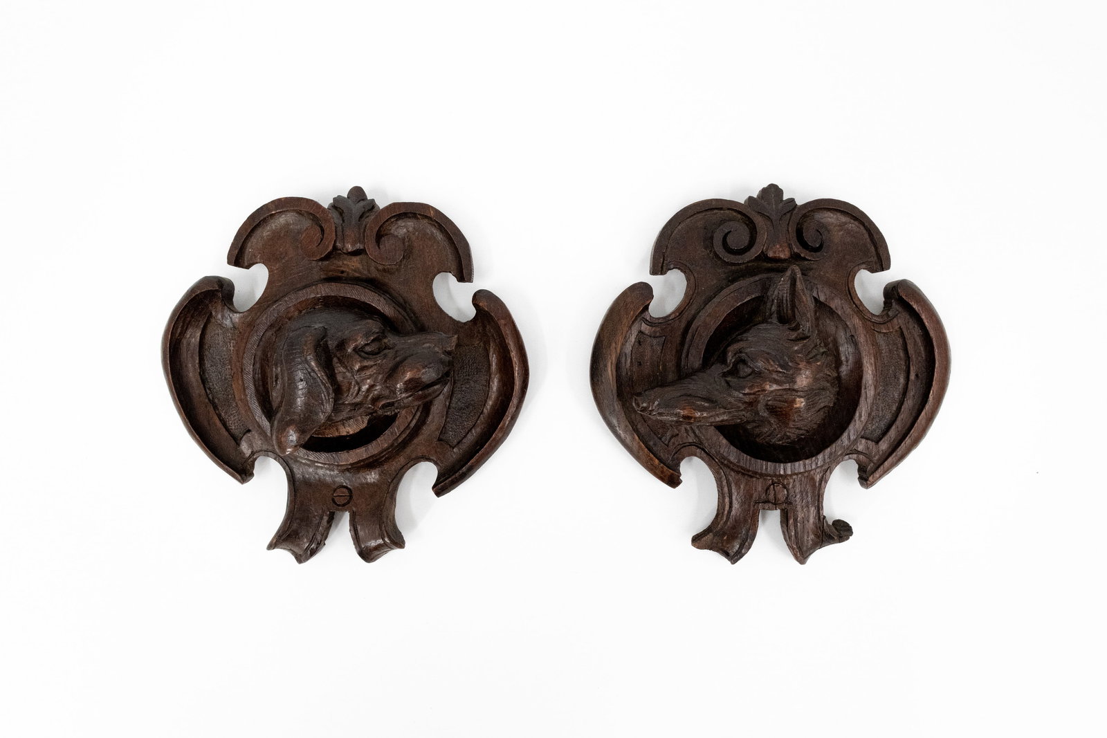 A matching pair of small antique carved wooden Black Forest wall bas-relief sculptures (1 of 5)