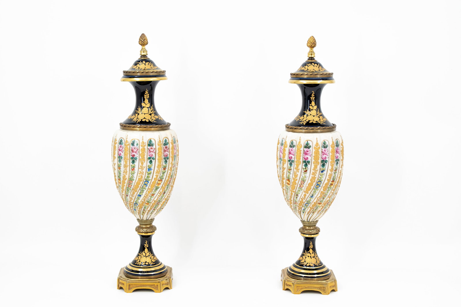 A pair of French Sevres style gilt on cobalt porcelain vases (1 of 8)