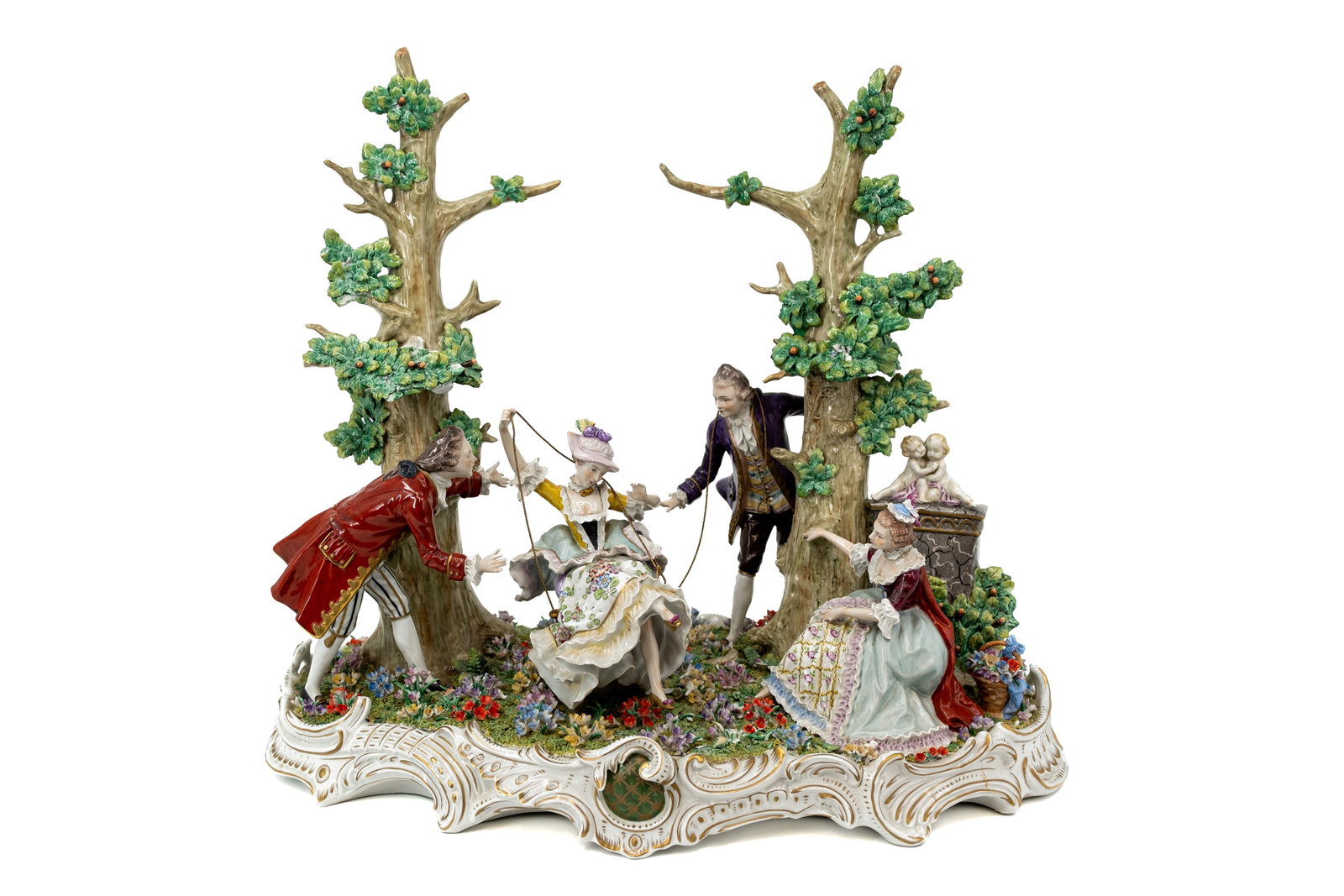 A large Sitzendorf porcelain group from Thuringia depicting a lively garden scene: A large Sitzendorf porcelain Rococo-style group from Thuringia depicting a lively garden scene. Marked, 20th century. Condition: some fingers and leaves are missing, report available on request. H: 44