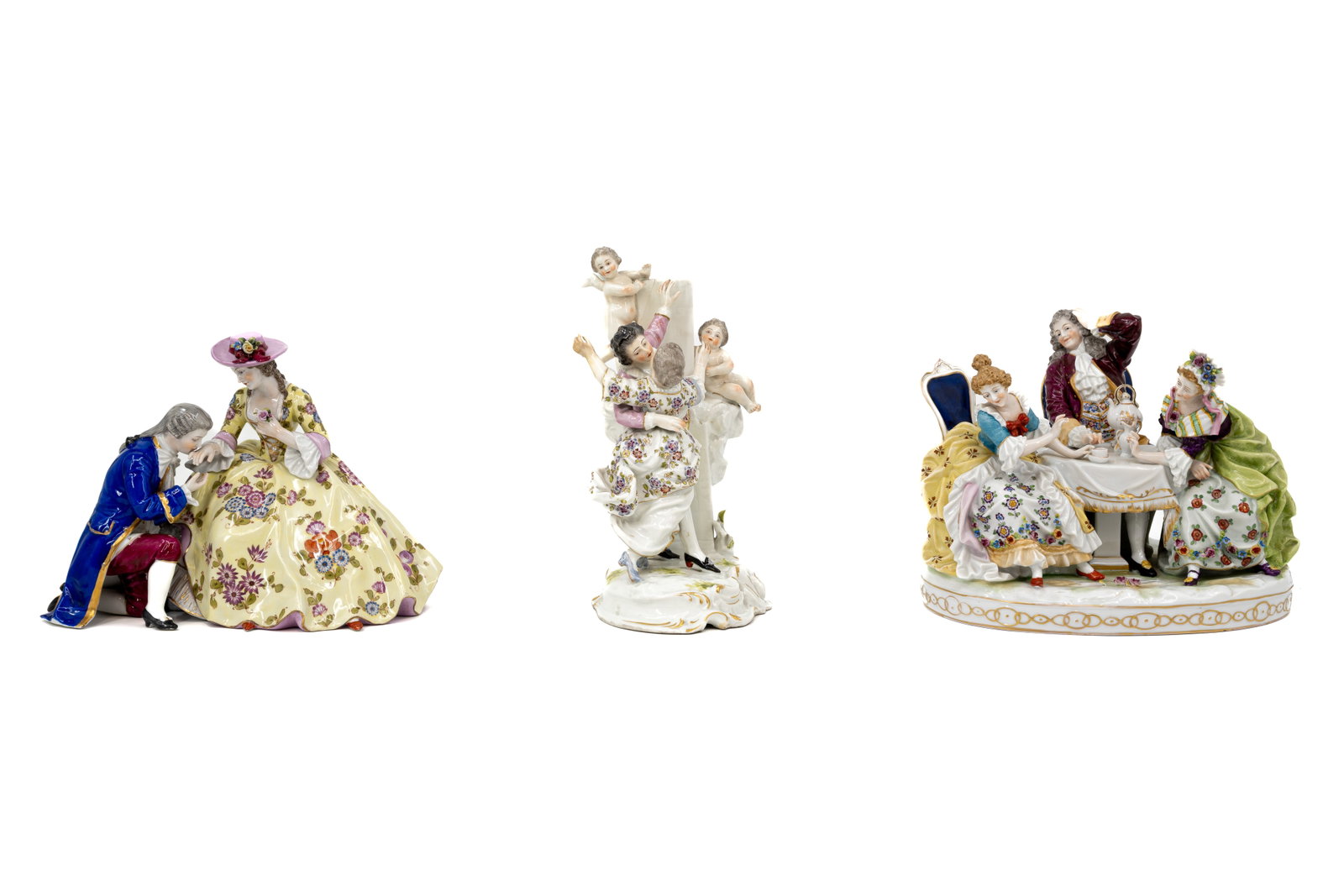A composed lot of three various shaped and marked figural porcelain romance groups: A composed lot of three variously shaped and marked figural porcelain romantic groups. One with Napoli mark, one French Samson mark and one Volkstedt style mark. 19th/20th century. Condition: the smal