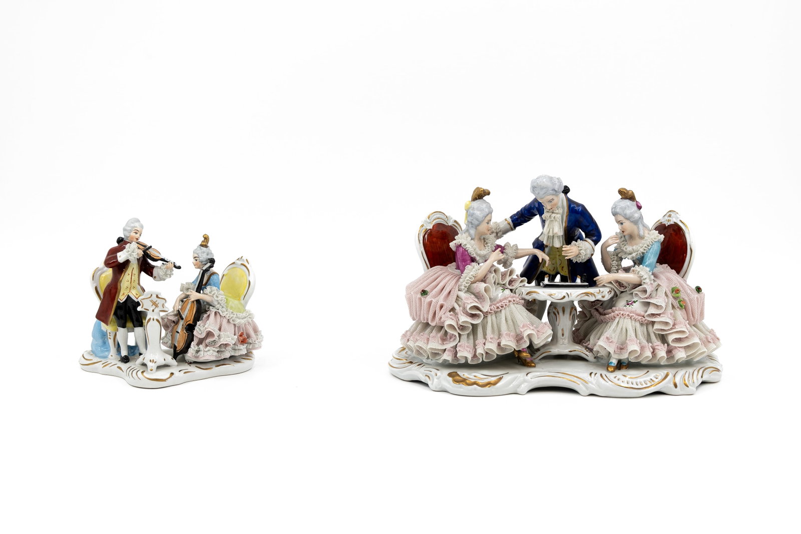 A composed lot of two Dresden-style decorated porcelain figural groups (1 of 14)