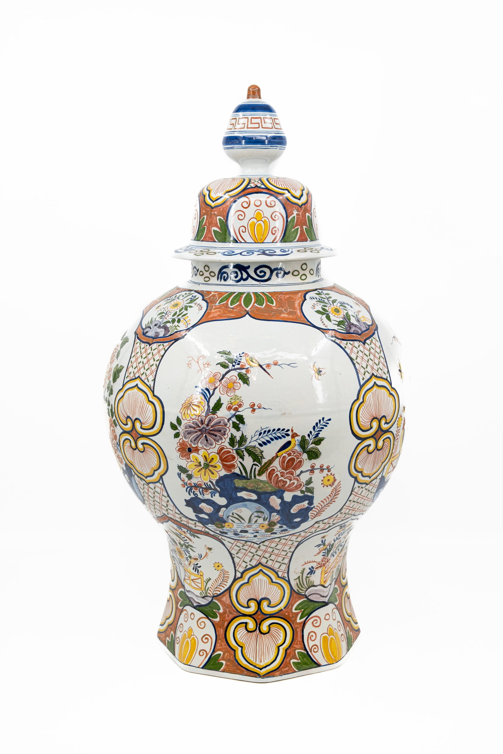 A large and imposing Dutch Delft-style polychrome-decorated ceramic covered vase: An imposing and large Dutch Delft-style polychrome-decorated ceramic covered vase. Marked, 20th century. H: 75 cm