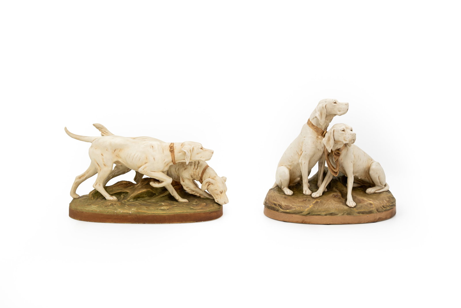 A composed lot of two Bohemian Royal Dux porcelain groups with hunting dogs (1 of 11)