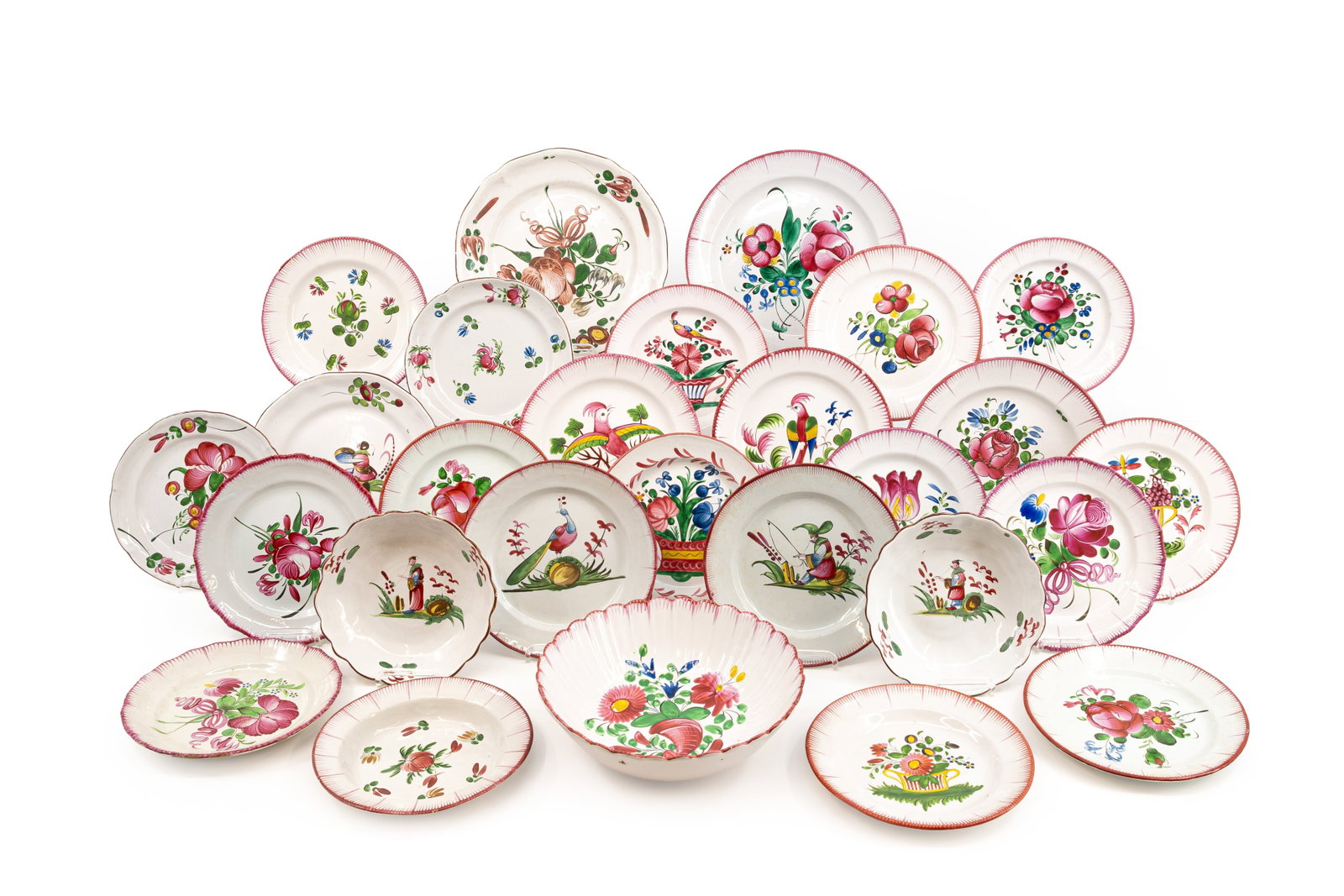 A large collection of 27 variously decorated "Faïence de l'Est" tableware items: A large collection of 27 variously decorated "Faïence de l'Est" plates, dishes and bowls. Strasbourg, 19th/20th century. W: 20,5 - 30,5 cm, smallest to largest