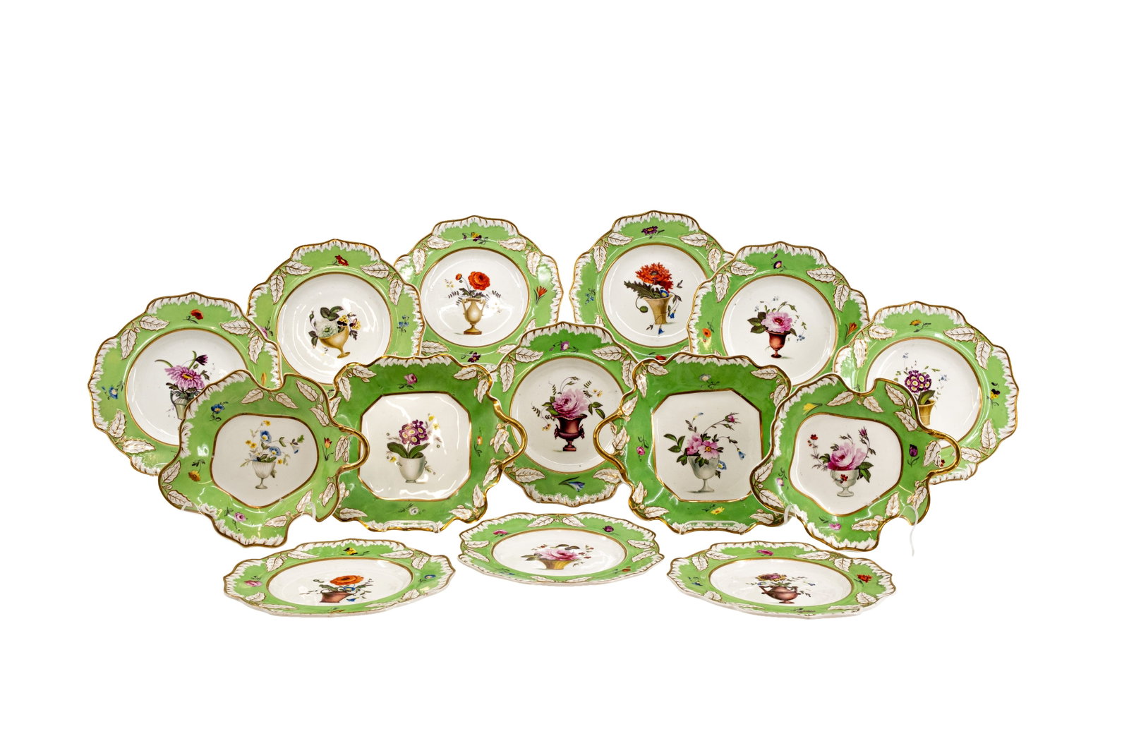 A matching set of 13 antique French, florally decorated porcelain plates: A matching set of 13 antique French, florally decorated porcelain dining and serving plates. Unmarked, late 19th century. W: 24,5 - 25 - 29 cm