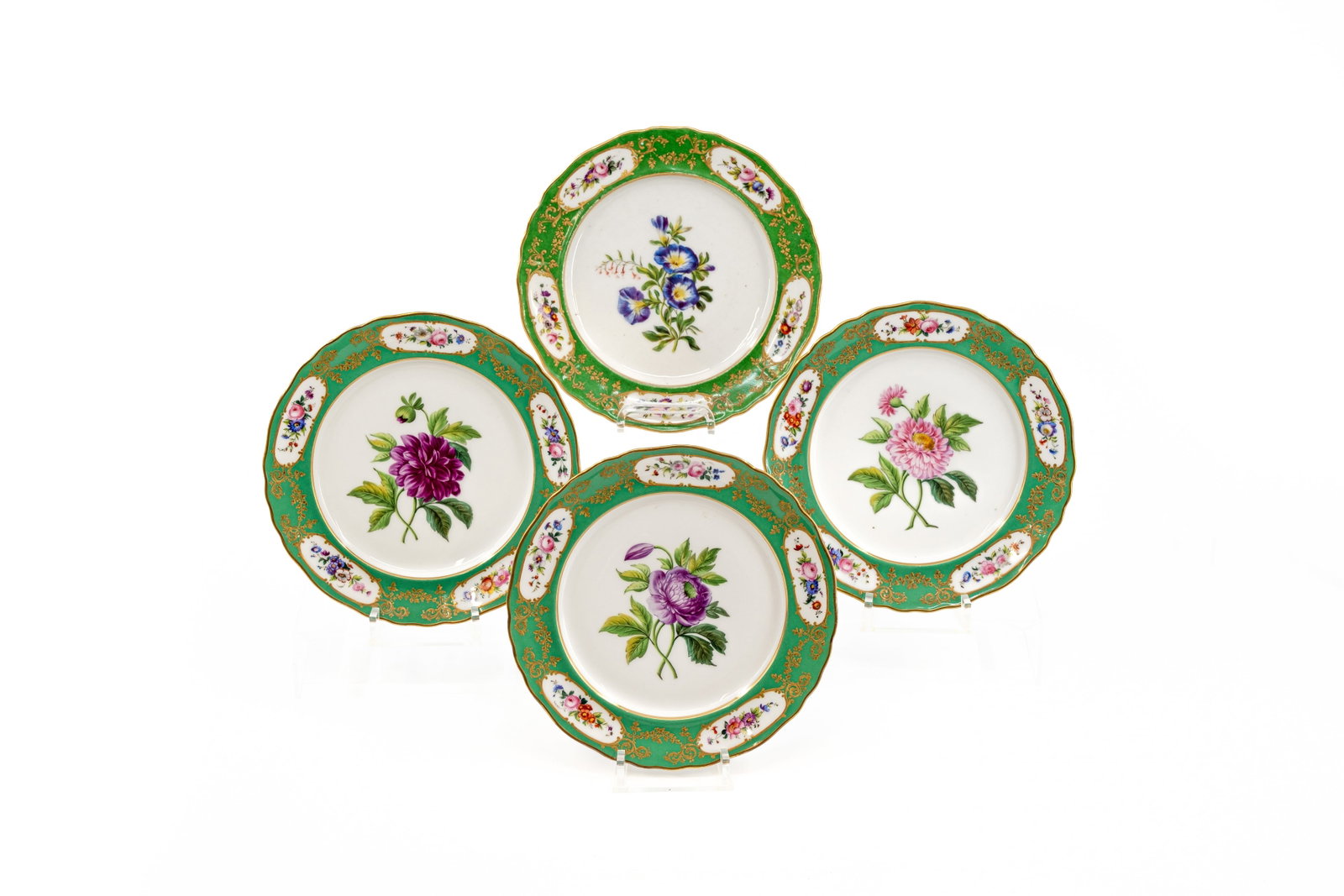 A lot of four antique French Sèvres-style porcelain cabinet plates with floral decoration: A lot of four antique French Sèvres-style porcelain cabinet plates with floral decoration. Late 19th century. W: 22 cm