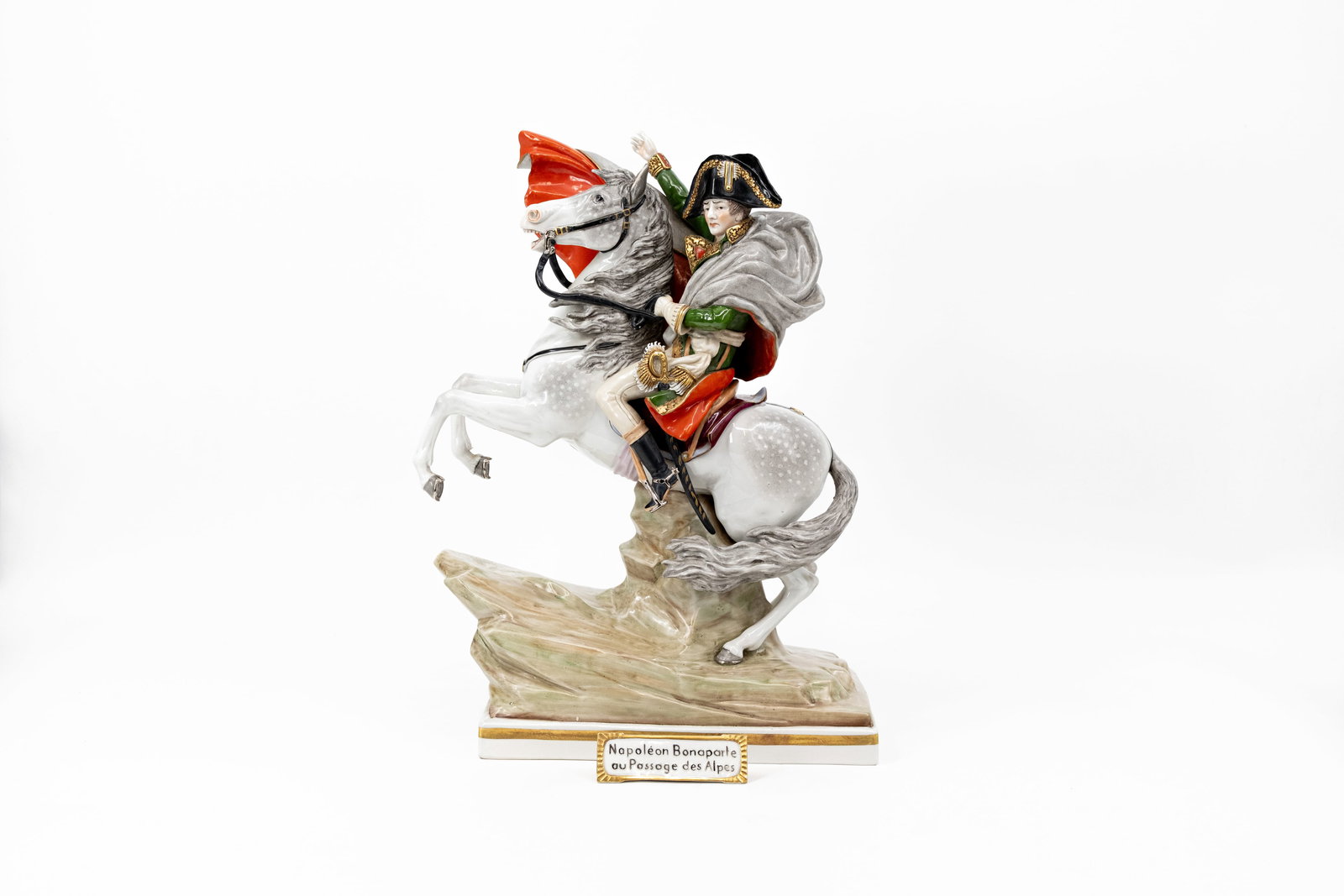 A large glazed porcelain figure of Napoleon on his horse, "Crossing The Alps": A large glazed porcelain figure of Napoleon on his horse, "Crossing The Alps". Napoli marked, 20th century. H: 40 - W: 32 cm
