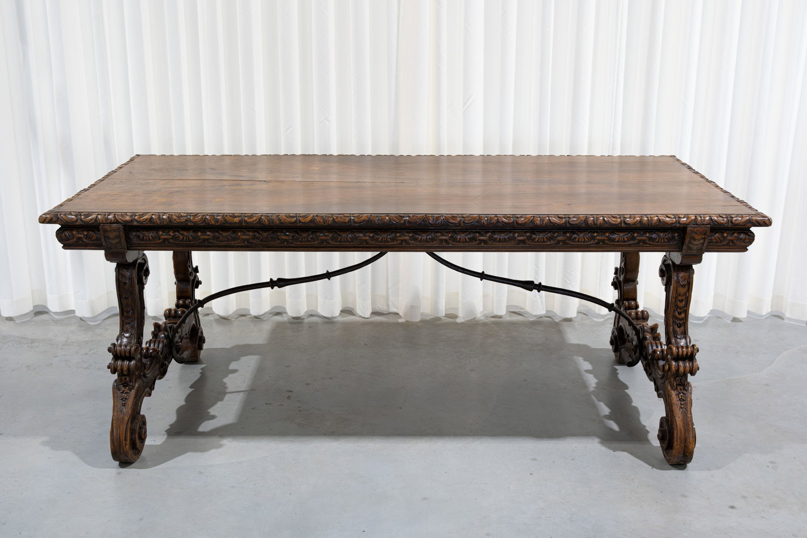 An antique Spanish Renaissance-style walnut and iron mounted dining table (1 of 10)